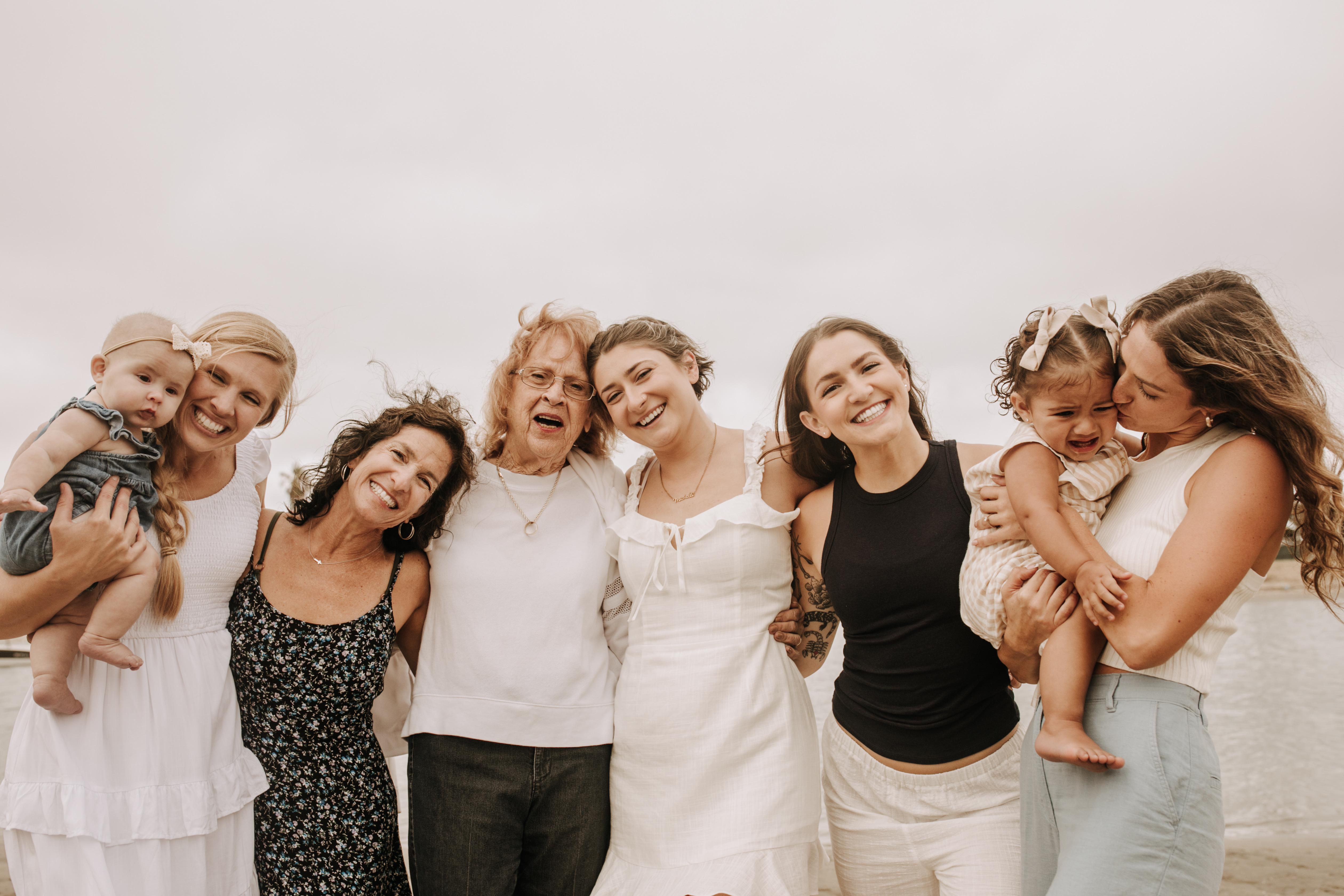 large family beach session family photos on the beach cloudy day big family great grand children San Diego family photographer