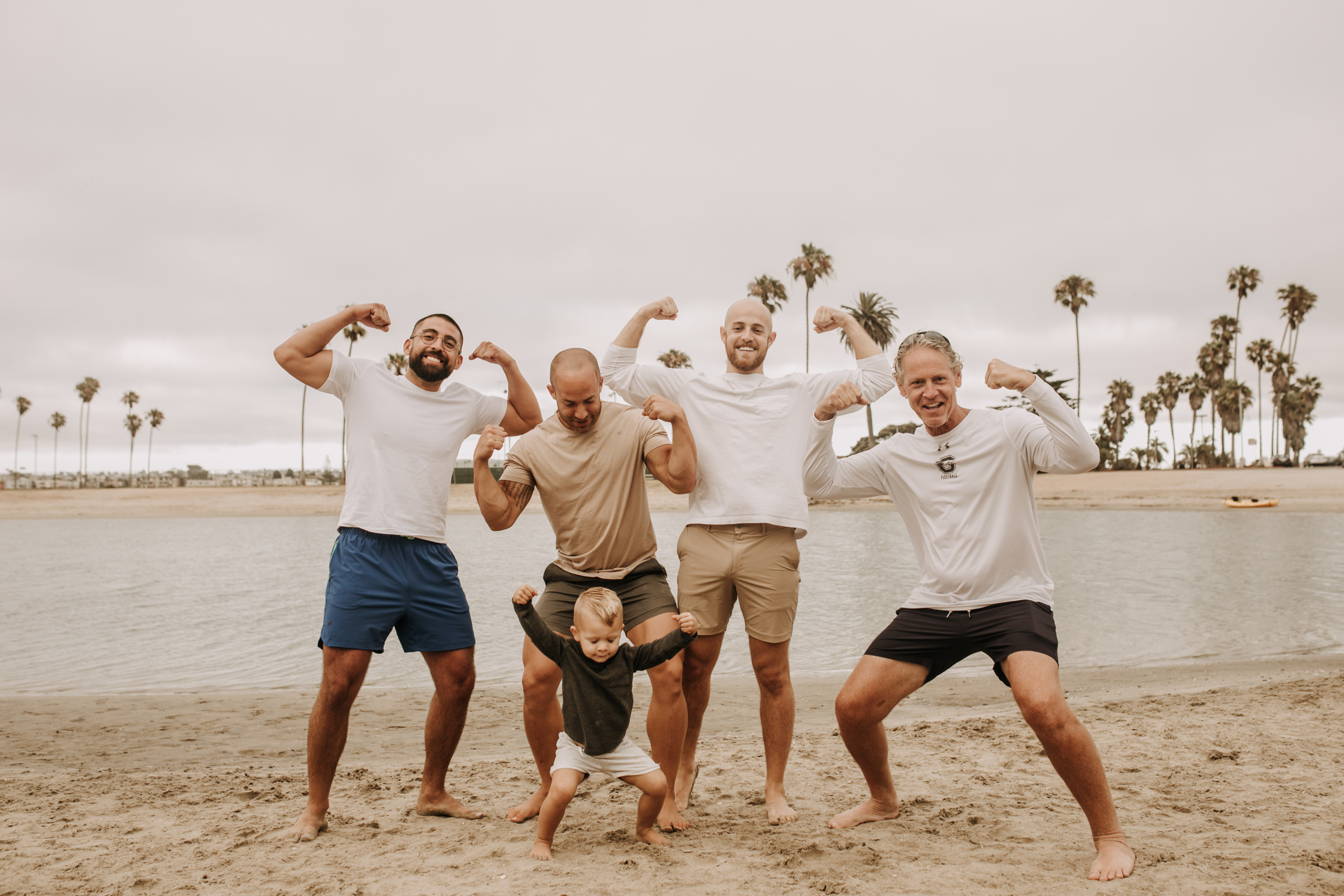 large family beach session family photos on the beach cloudy day big family great grand children San Diego family photographer