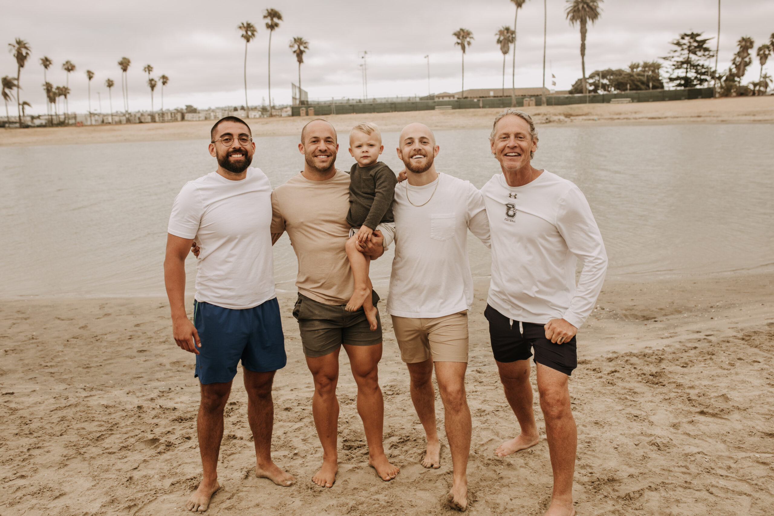 large family beach session family photos on the beach cloudy day big family great grand children San Diego family photographer