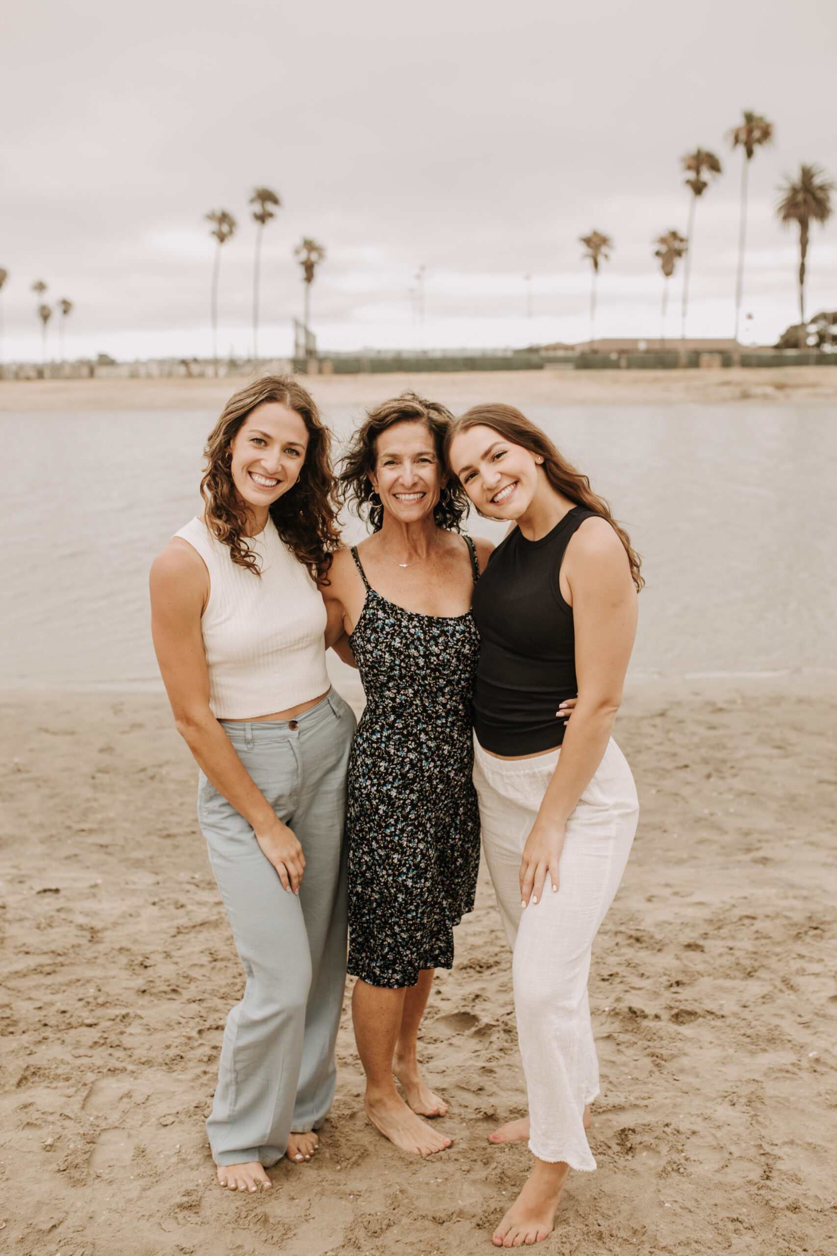 large family beach session family photos on the beach cloudy day big family great grand children San Diego family photographer