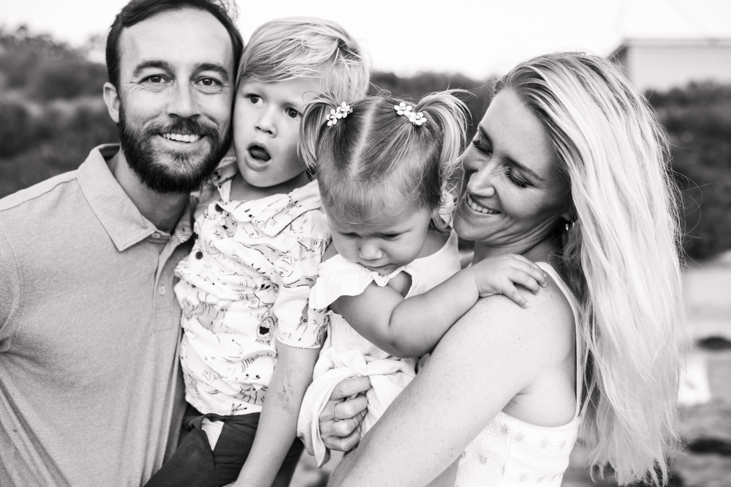 Family photos on the beach cool blue toned family photos San Diego photography family of four candid family moments family love beach family photos San Diego family photographer Sabrinalynnphoto