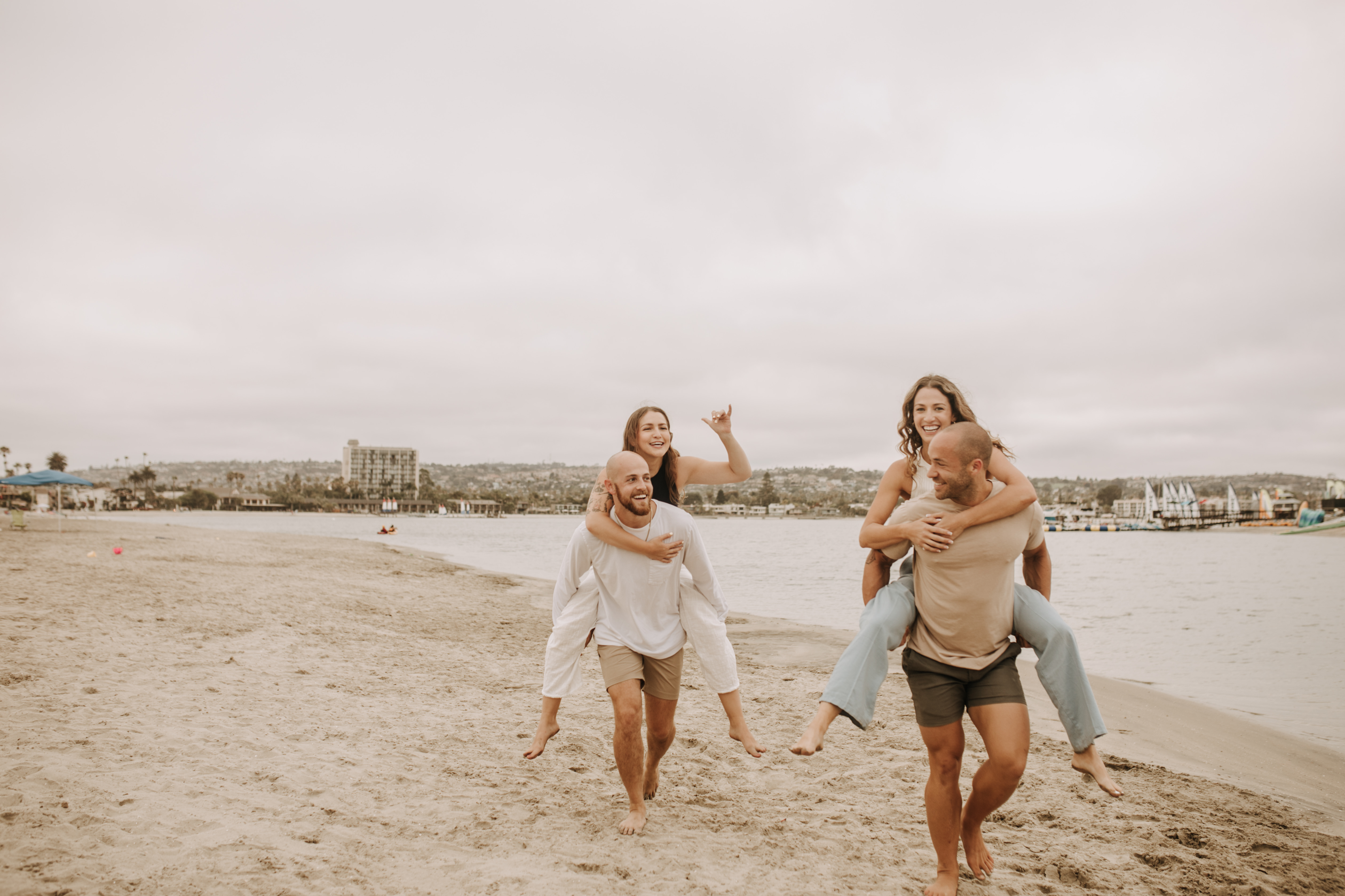 large family beach session family photos on the beach cloudy day big family great grand children San Diego family photographer