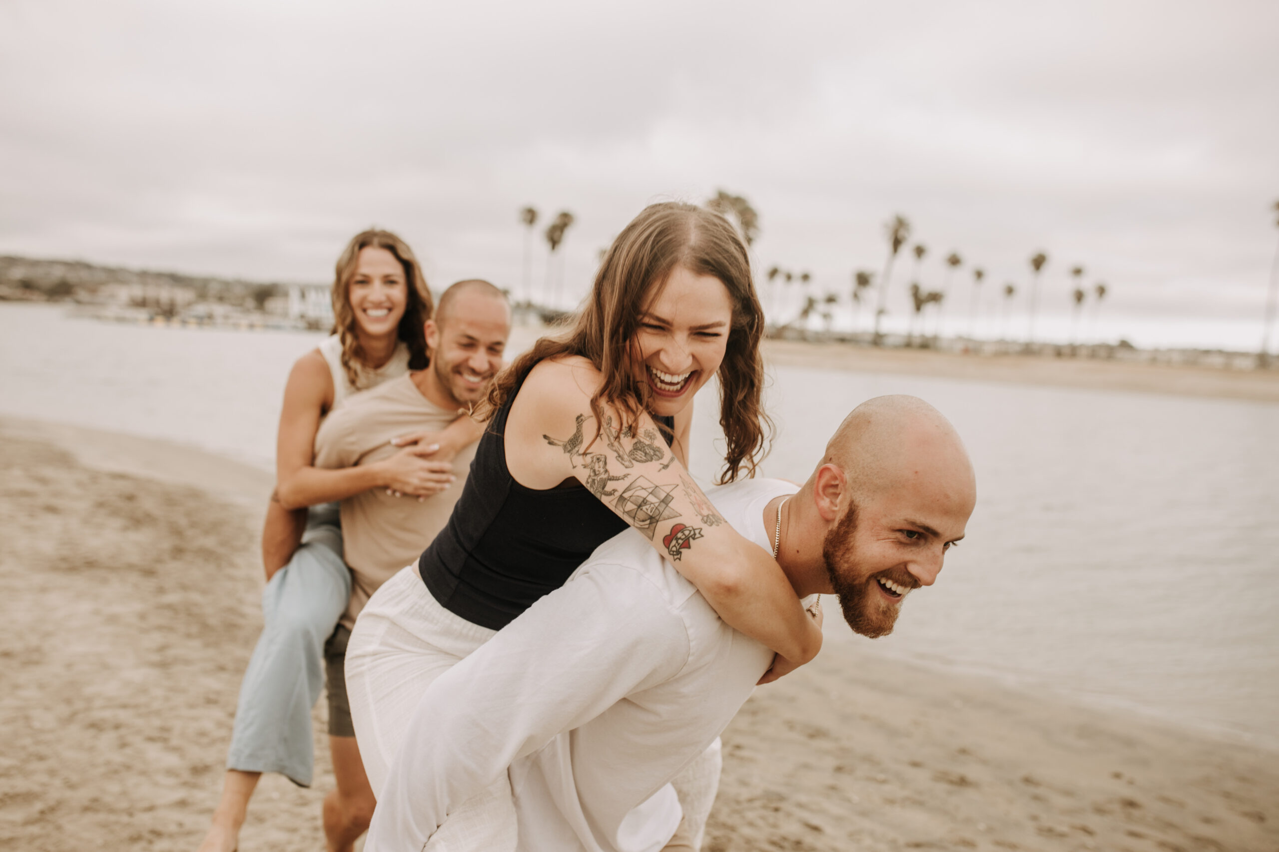 large family beach session family photos on the beach cloudy day big family great grand children San Diego family photographer