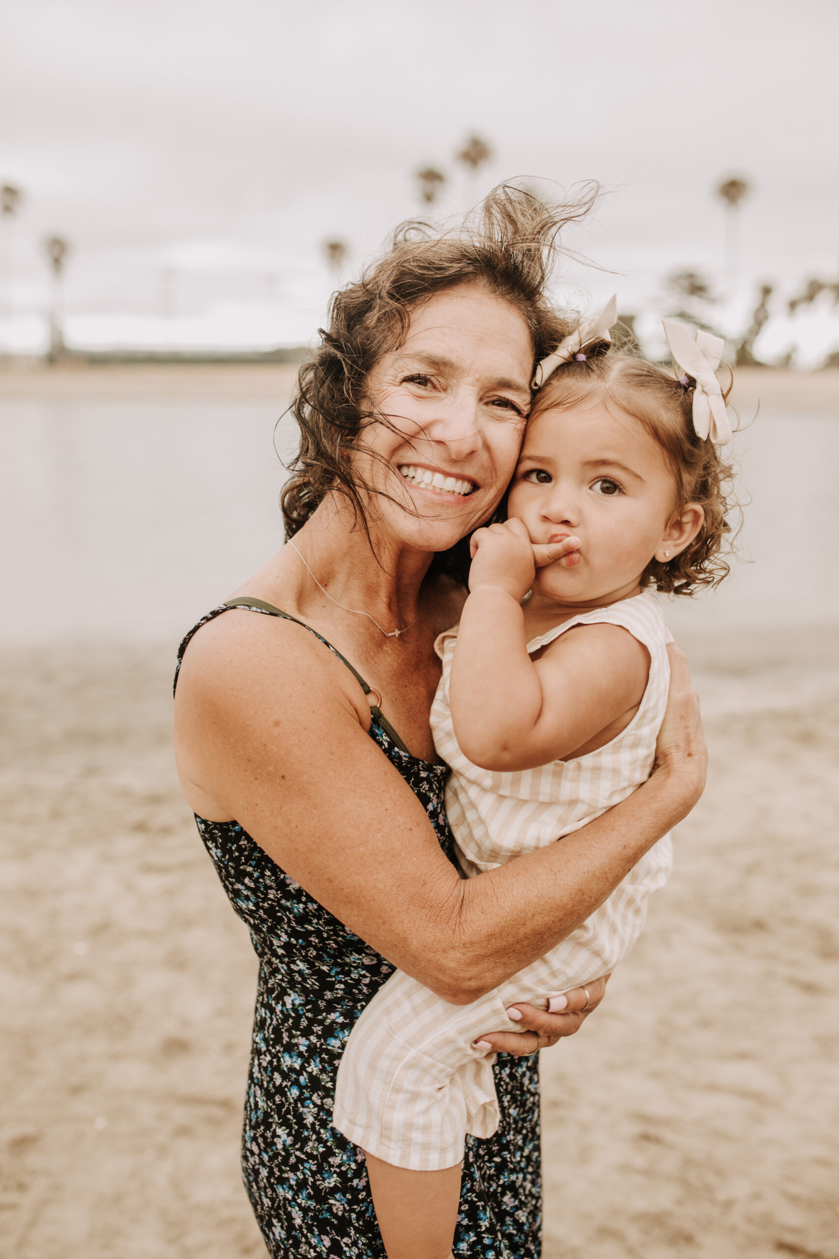 large family beach session family photos on the beach cloudy day big family great grand children San Diego family photographer