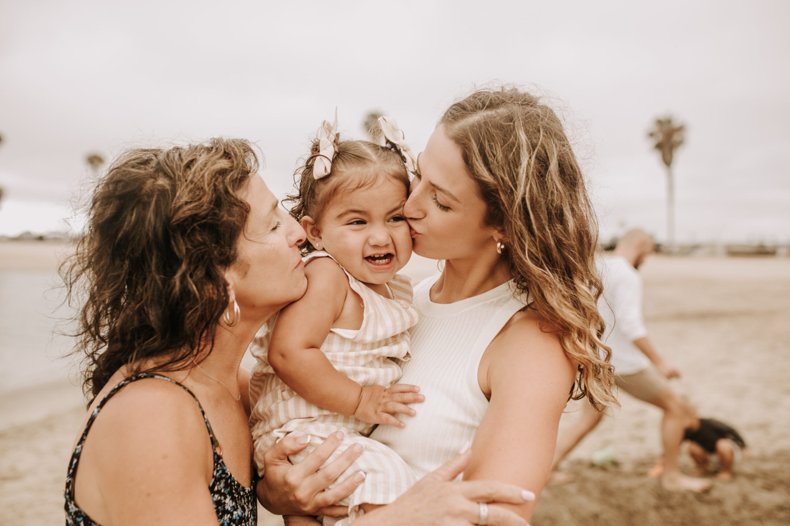 large family beach session family photos on the beach cloudy day big family great grand children San Diego family photographer