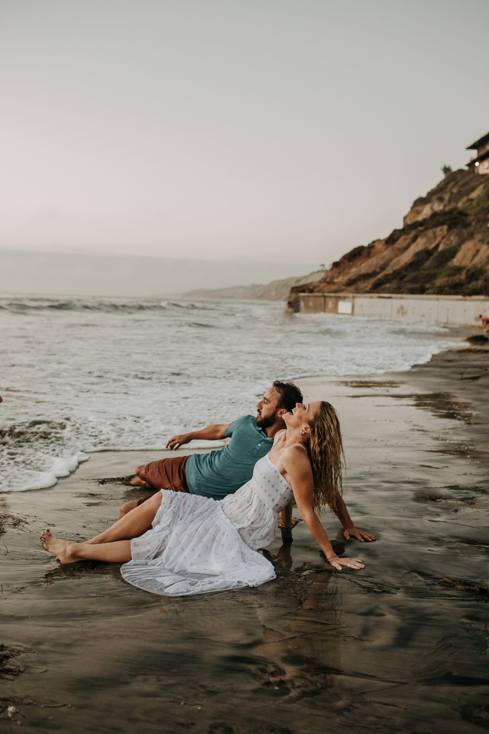 Family photos on the beach cool blue toned family photos San Diego photography family of four candid family moments family love beach family photos San Diego family photographer Sabrinalynnphoto