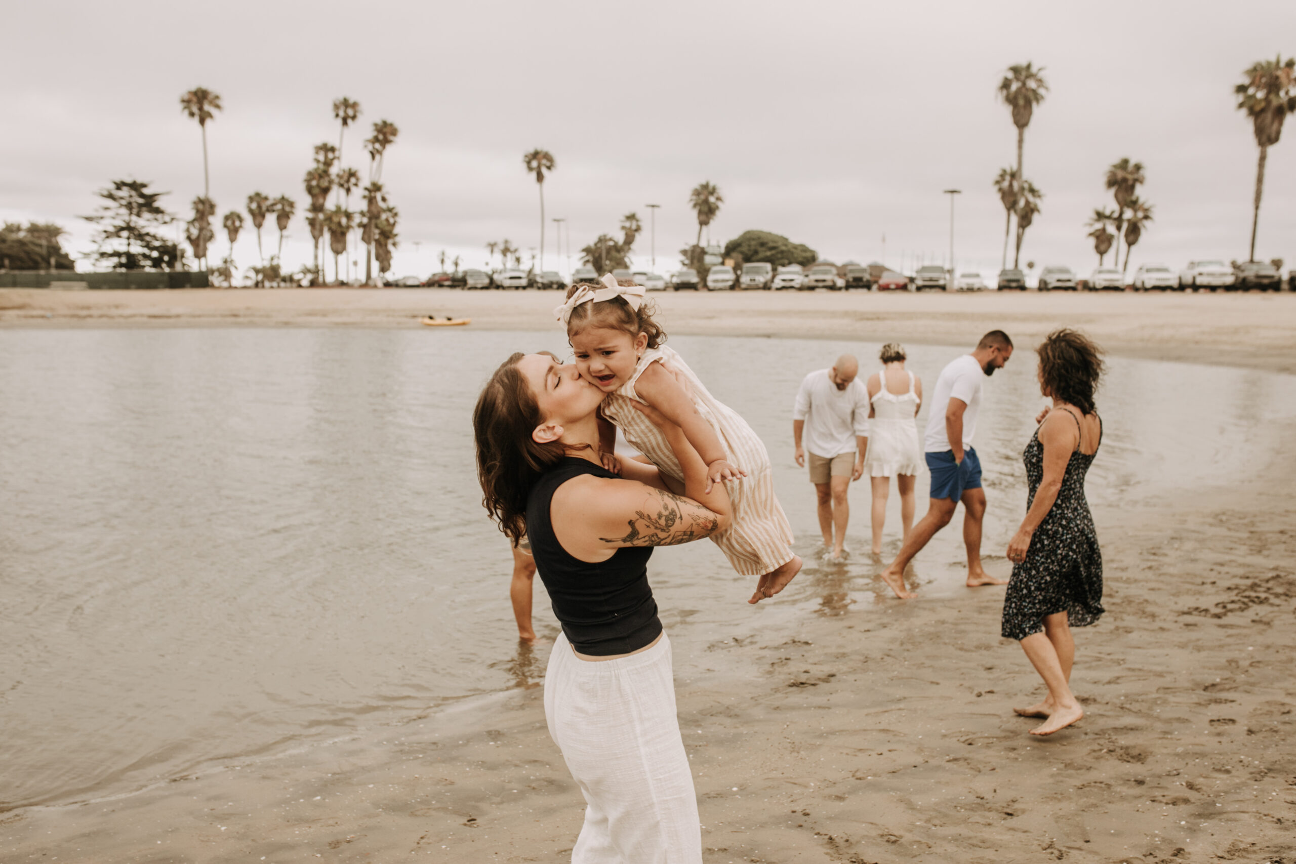 large family beach session family photos on the beach cloudy day big family great grand children San Diego family photographer