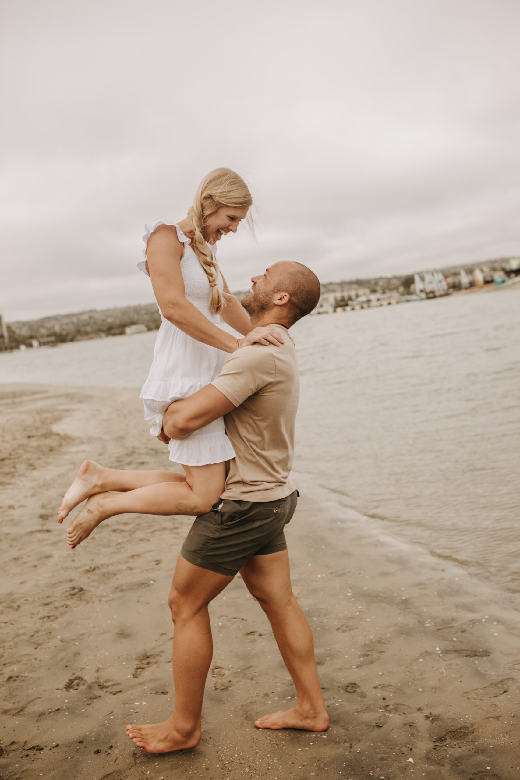 large family beach session family photos on the beach cloudy day big family great grand children San Diego family photographer