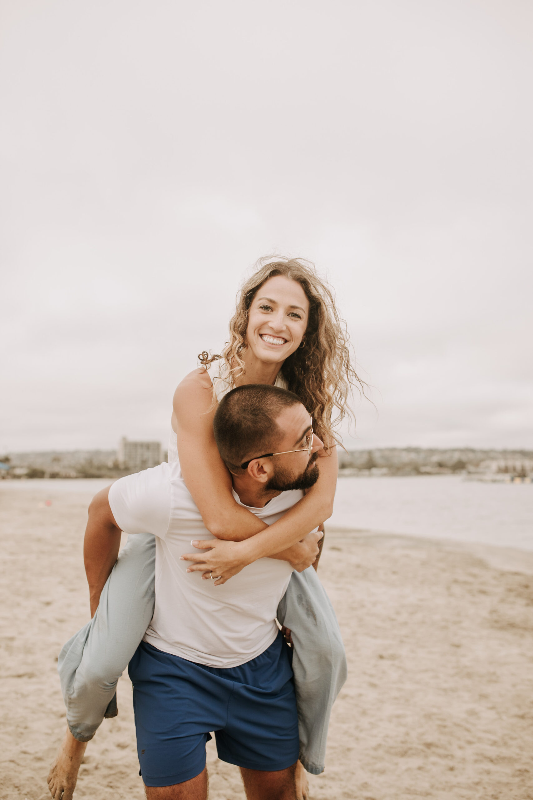 large family beach session family photos on the beach cloudy day big family great grand children San Diego family photographer