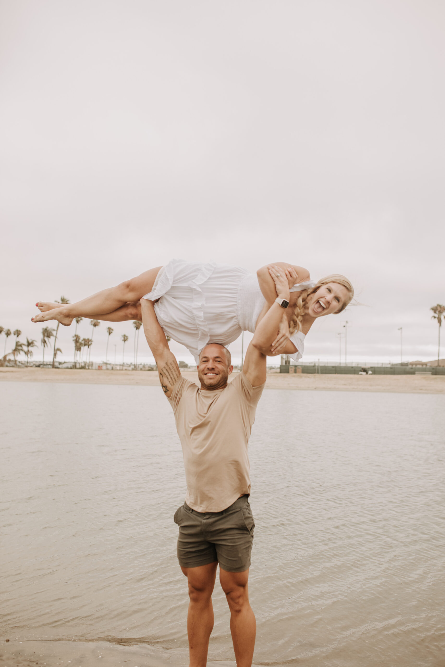 large family beach session family photos on the beach cloudy day big family great grand children San Diego family photographer