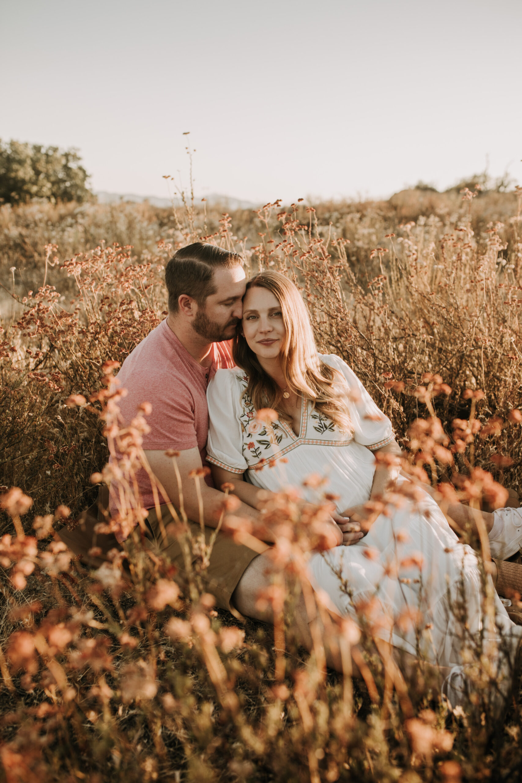 outdoor maternity photos warm and sunny maternity photos couples photos summer field white dress pregnancy San Diego photographer Sabrina kinsella