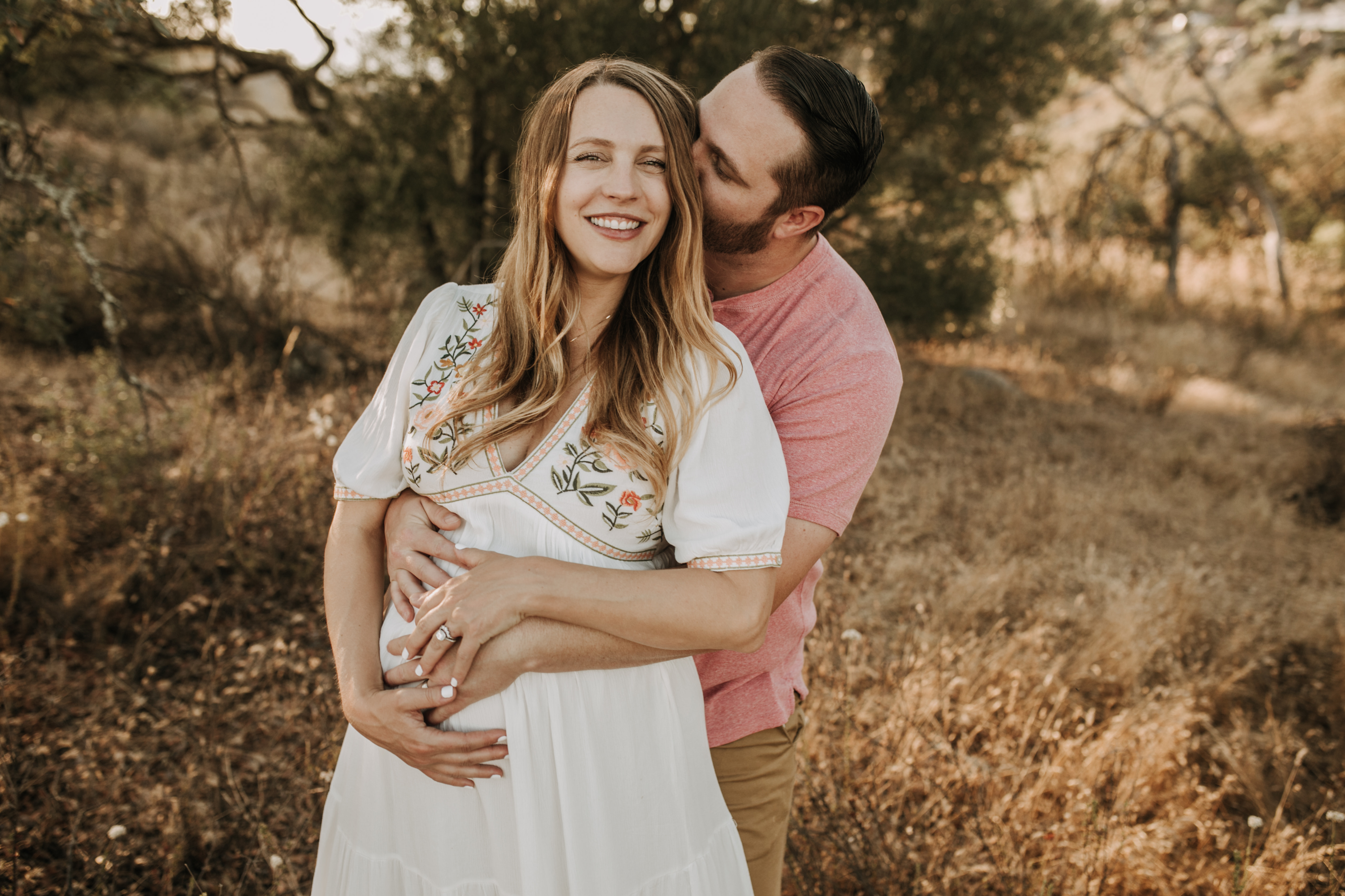 outdoor maternity photos warm and sunny maternity photos couples photos summer field white dress pregnancy San Diego photographer Sabrina kinsella