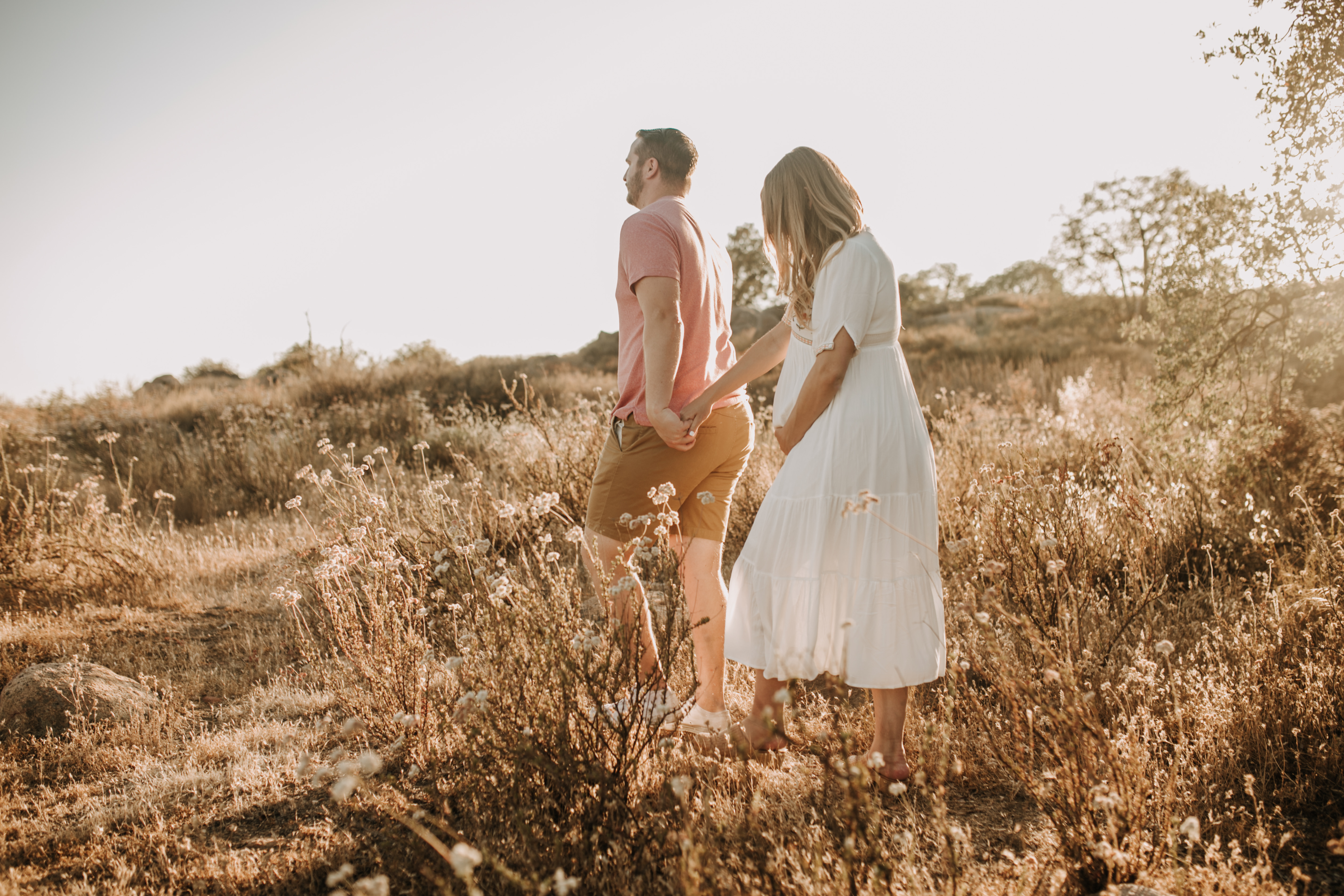 outdoor maternity photos warm and sunny maternity photos couples photos summer field white dress pregnancy San Diego photographer Sabrina kinsella