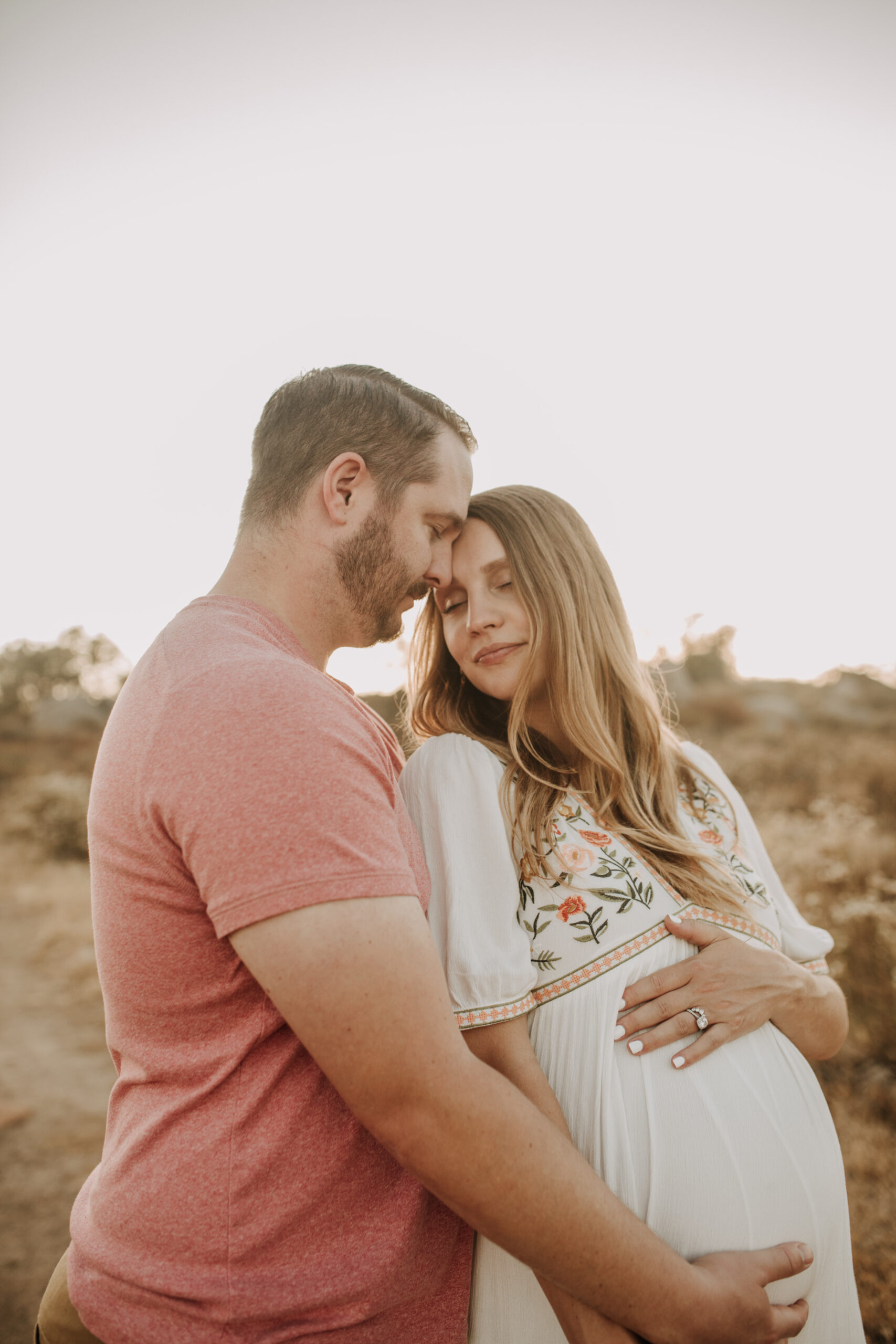 outdoor maternity photos warm and sunny maternity photos couples photos summer field white dress pregnancy San Diego photographer Sabrina kinsella