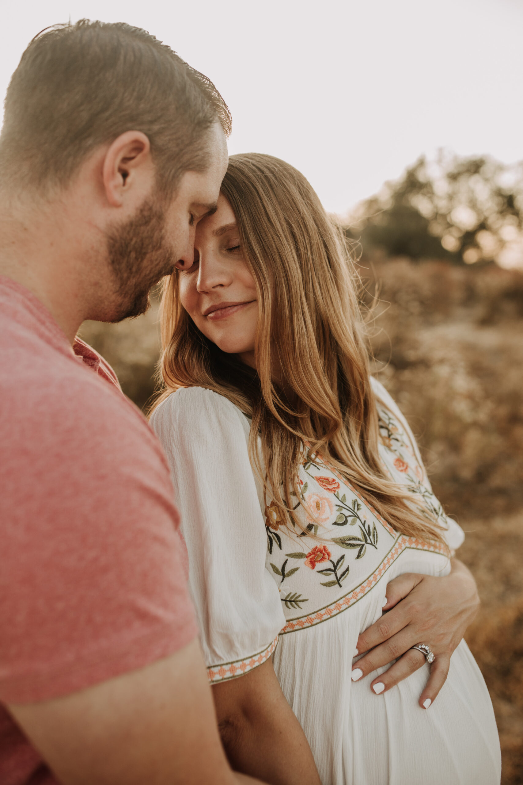 outdoor maternity photos warm and sunny maternity photos couples photos summer field white dress pregnancy San Diego photographer Sabrina kinsella