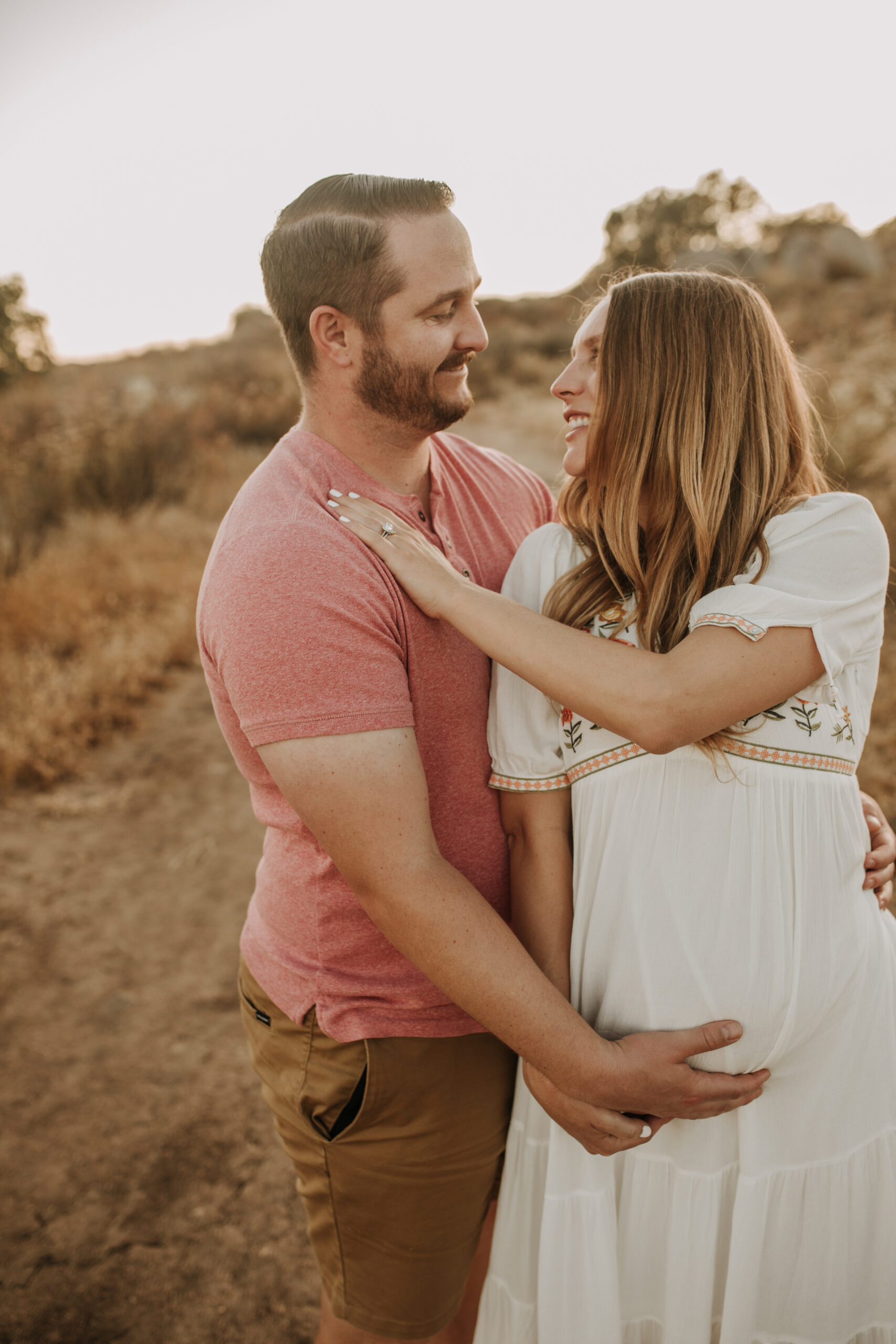 outdoor maternity photos warm and sunny maternity photos couples photos summer field white dress pregnancy San Diego photographer Sabrina kinsella