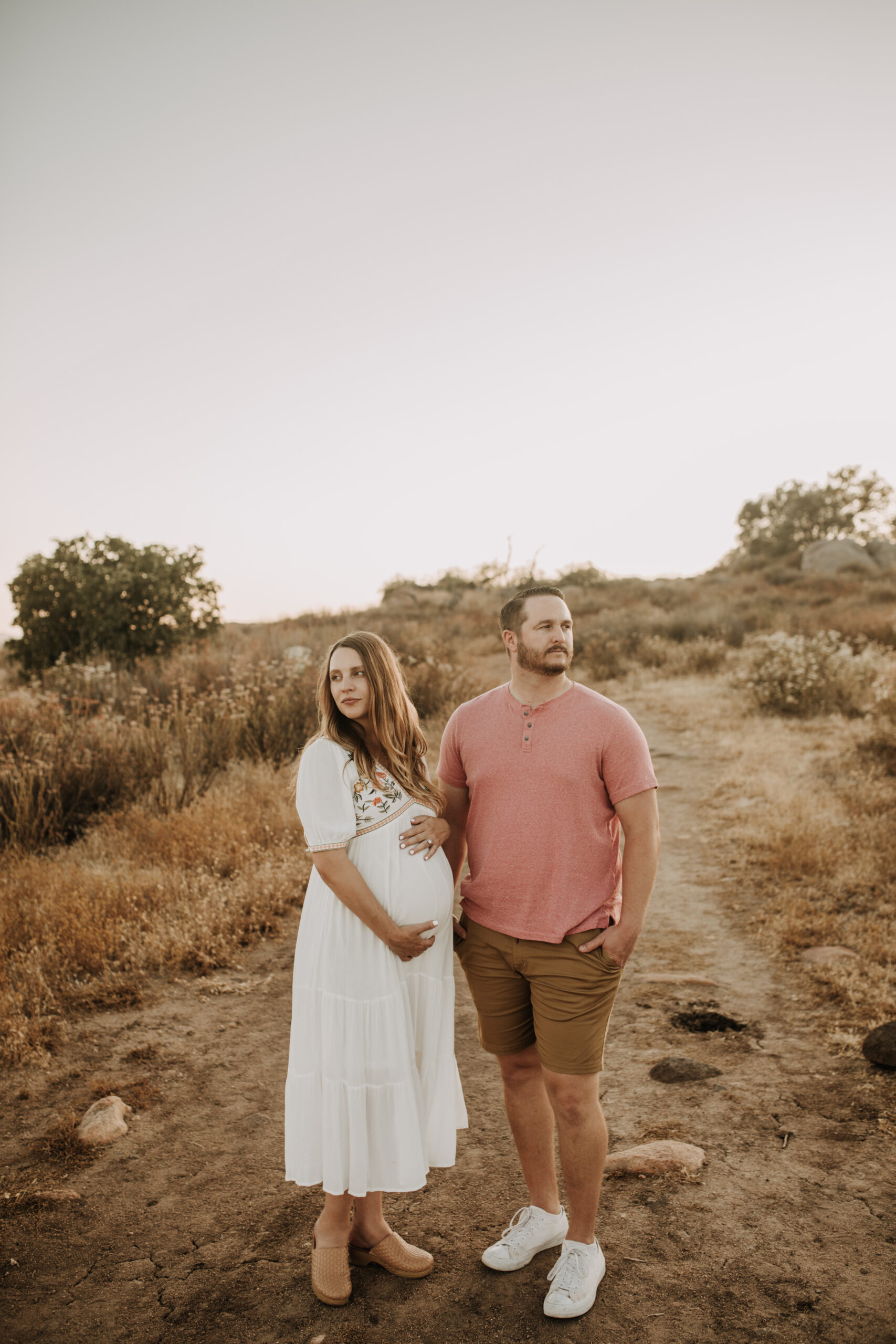 outdoor maternity photos warm and sunny maternity photos couples photos summer field white dress pregnancy San Diego photographer Sabrina kinsella