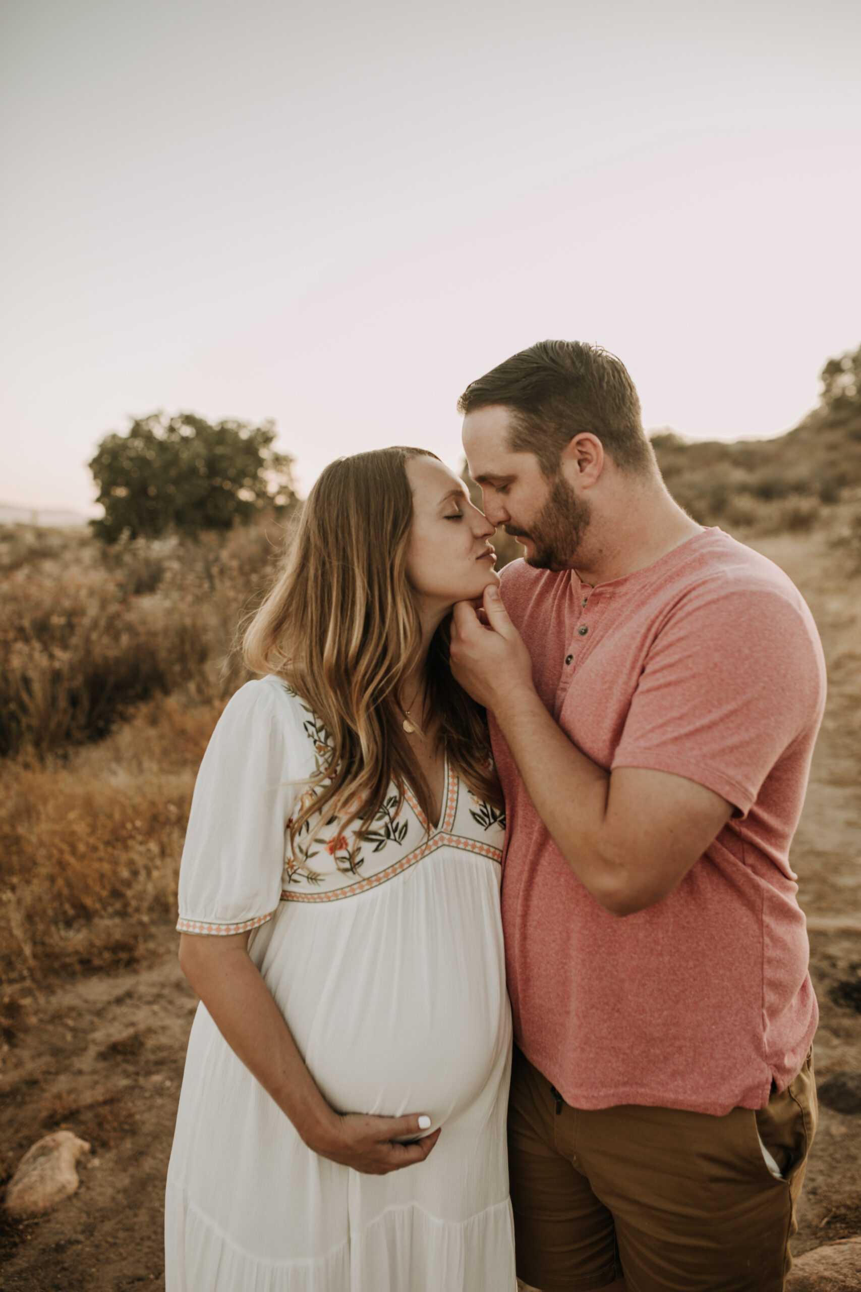 outdoor maternity photos warm and sunny maternity photos couples photos summer field white dress pregnancy San Diego photographer Sabrina kinsella