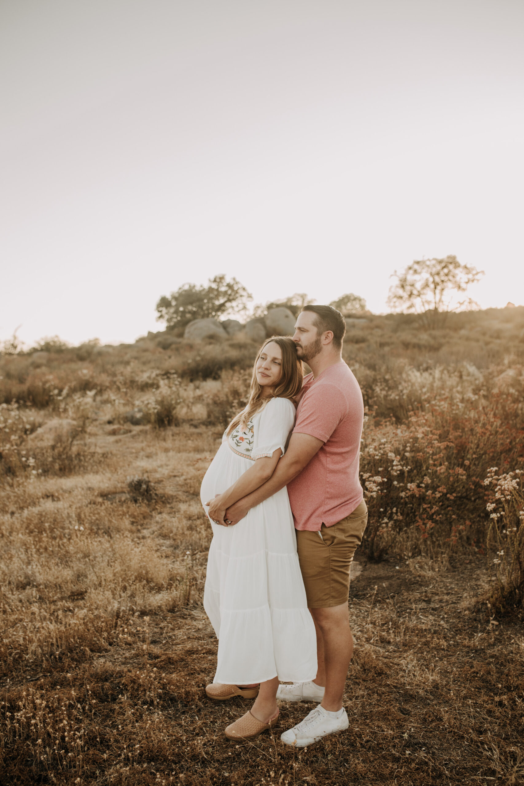 outdoor maternity photos warm and sunny maternity photos couples photos summer field white dress pregnancy San Diego photographer Sabrina kinsella