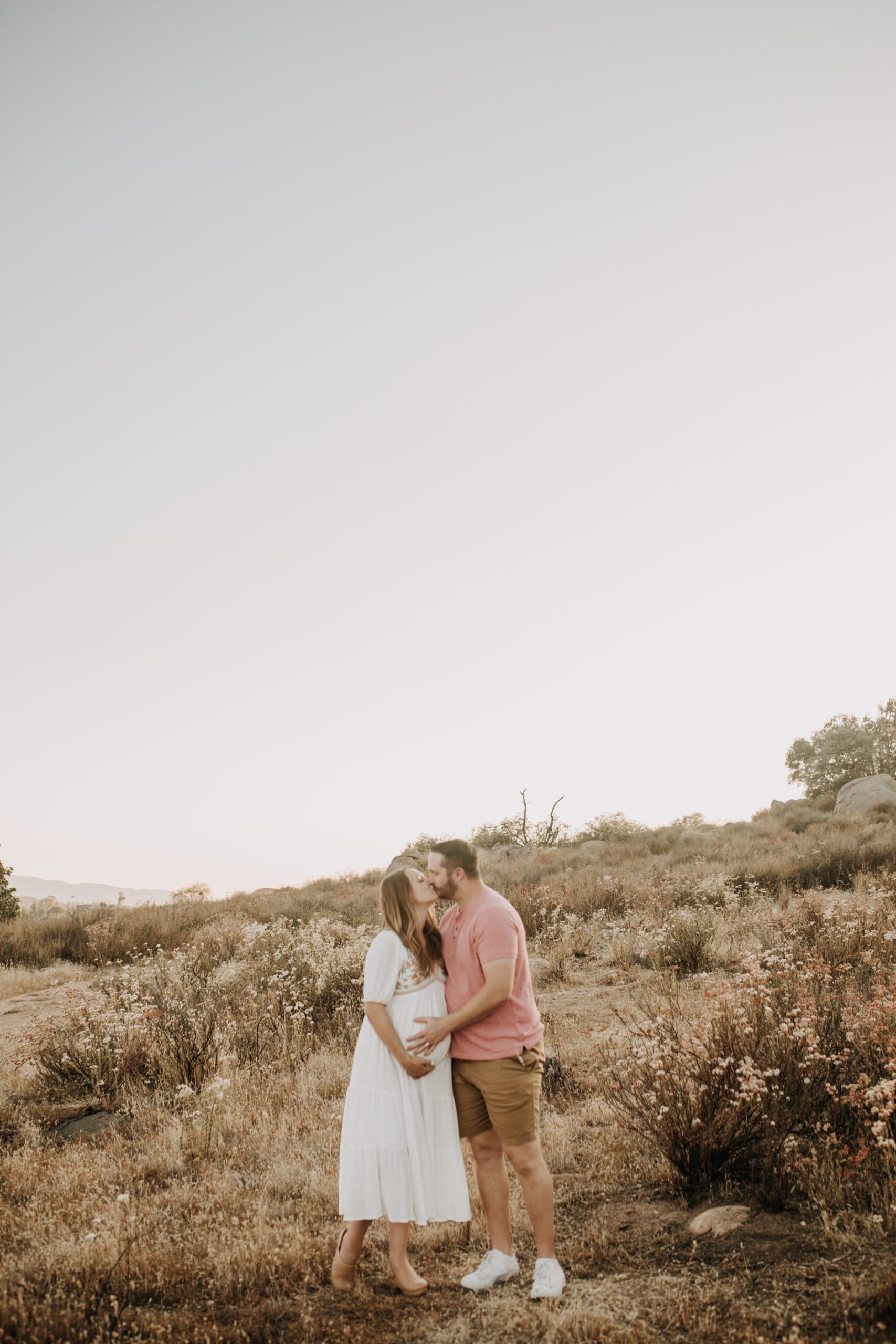 outdoor maternity photos warm and sunny maternity photos couples photos summer field white dress pregnancy San Diego photographer Sabrina kinsella