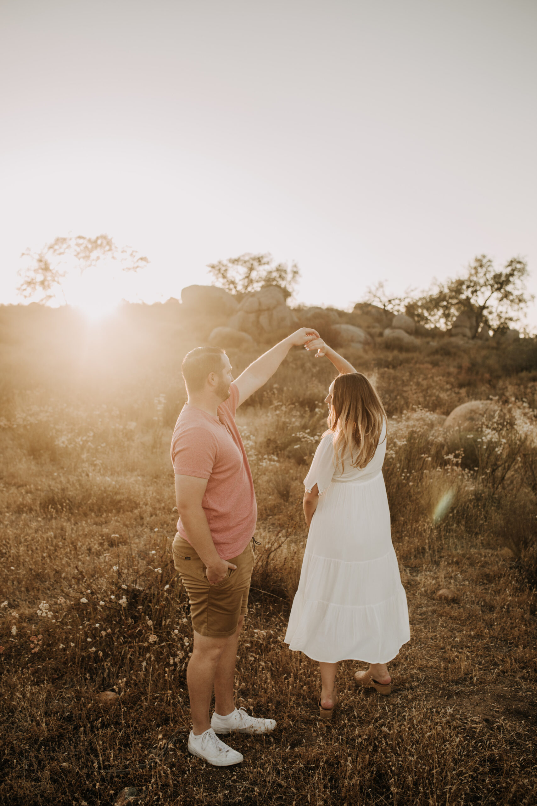 outdoor maternity photos warm and sunny maternity photos couples photos summer field white dress pregnancy San Diego photographer Sabrina kinsella