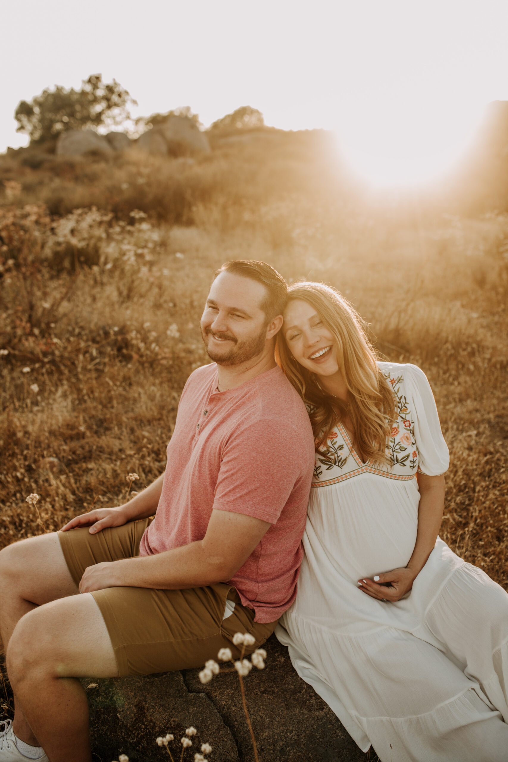 outdoor maternity photos warm and sunny maternity photos couples photos summer field white dress pregnancy San Diego photographer Sabrina kinsella