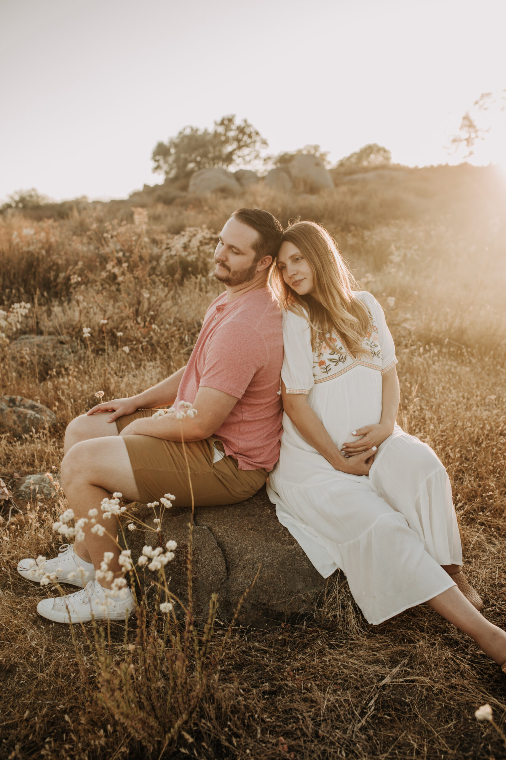 outdoor maternity photos warm and sunny maternity photos couples photos summer field white dress pregnancy San Diego photographer Sabrina kinsella