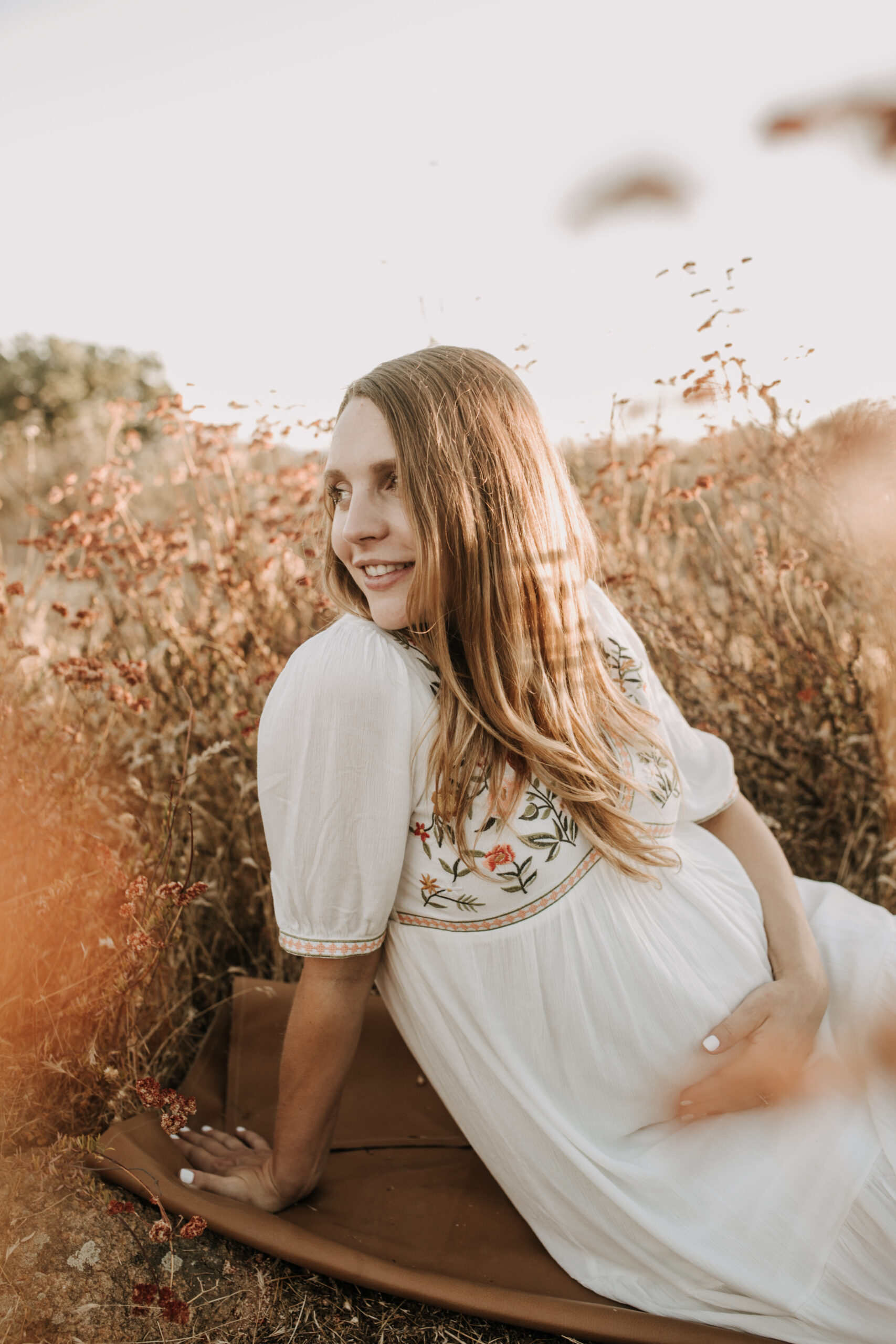 outdoor maternity photos warm and sunny maternity photos couples photos summer field white dress pregnancy San Diego photographer Sabrina kinsella