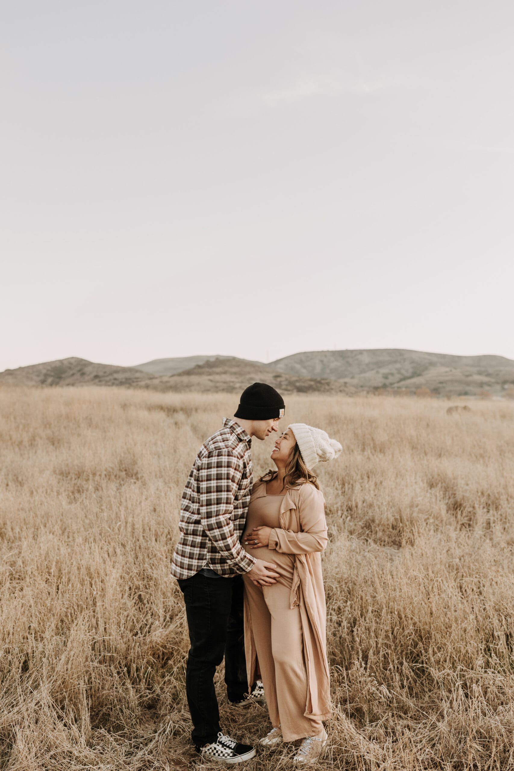 warm outdoor sunrise maternity photos San Diego brown tones backdrop pregnancy San Diego family photographer Sabrina kinsella