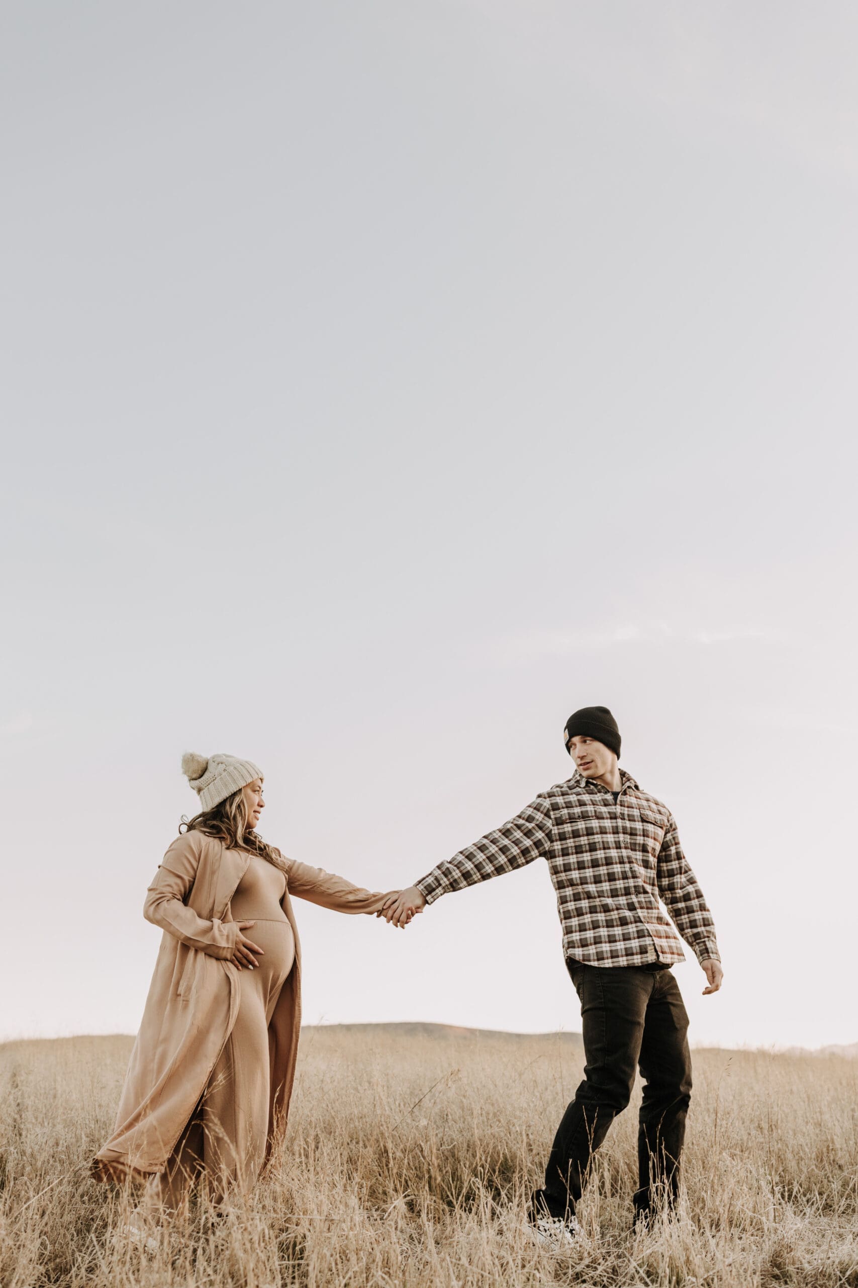 warm outdoor sunrise maternity photos San Diego brown tones backdrop pregnancy San Diego family photographer Sabrina kinsella