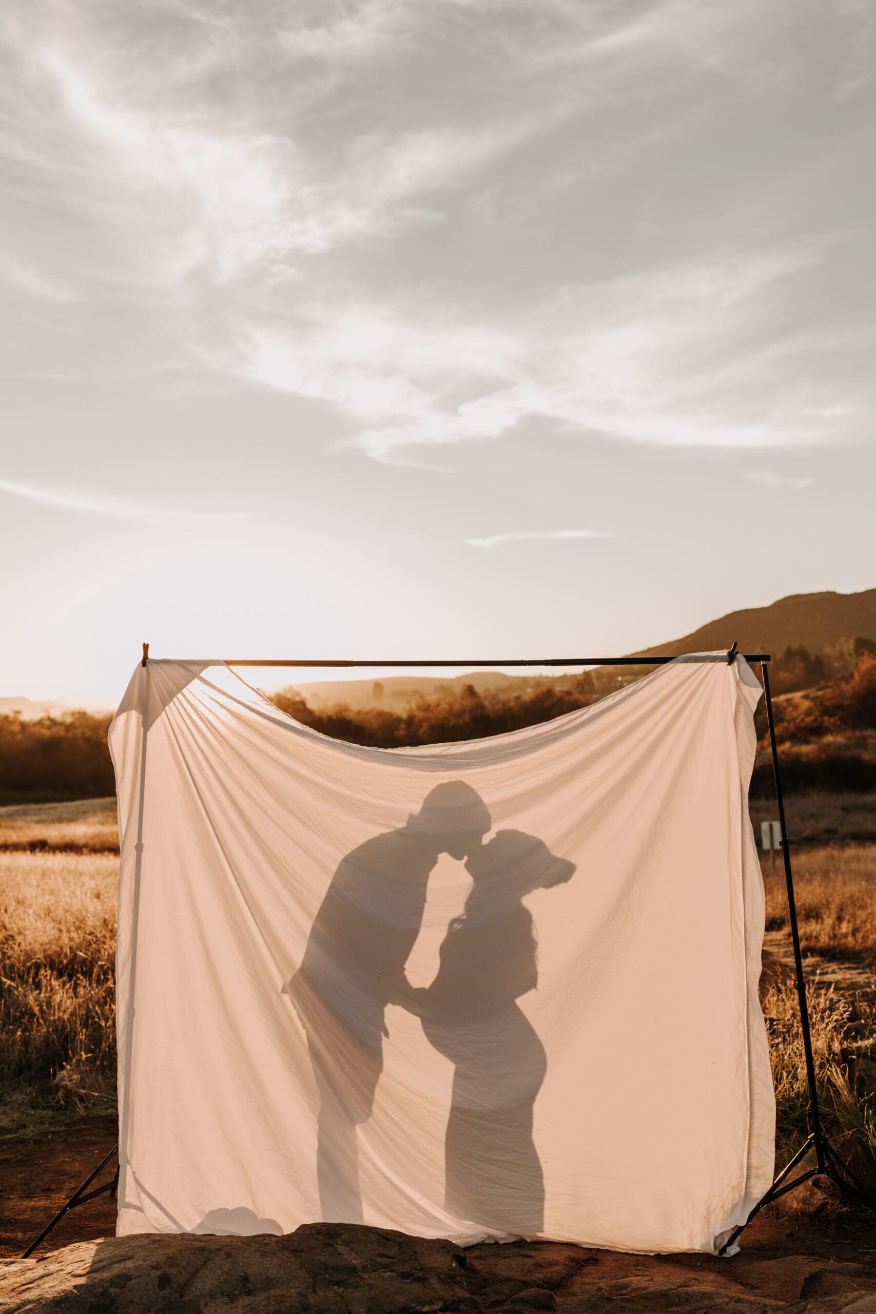 warm outdoor sunrise maternity photos San Diego brown tones backdrop pregnancy San Diego family photographer Sabrina kinsella