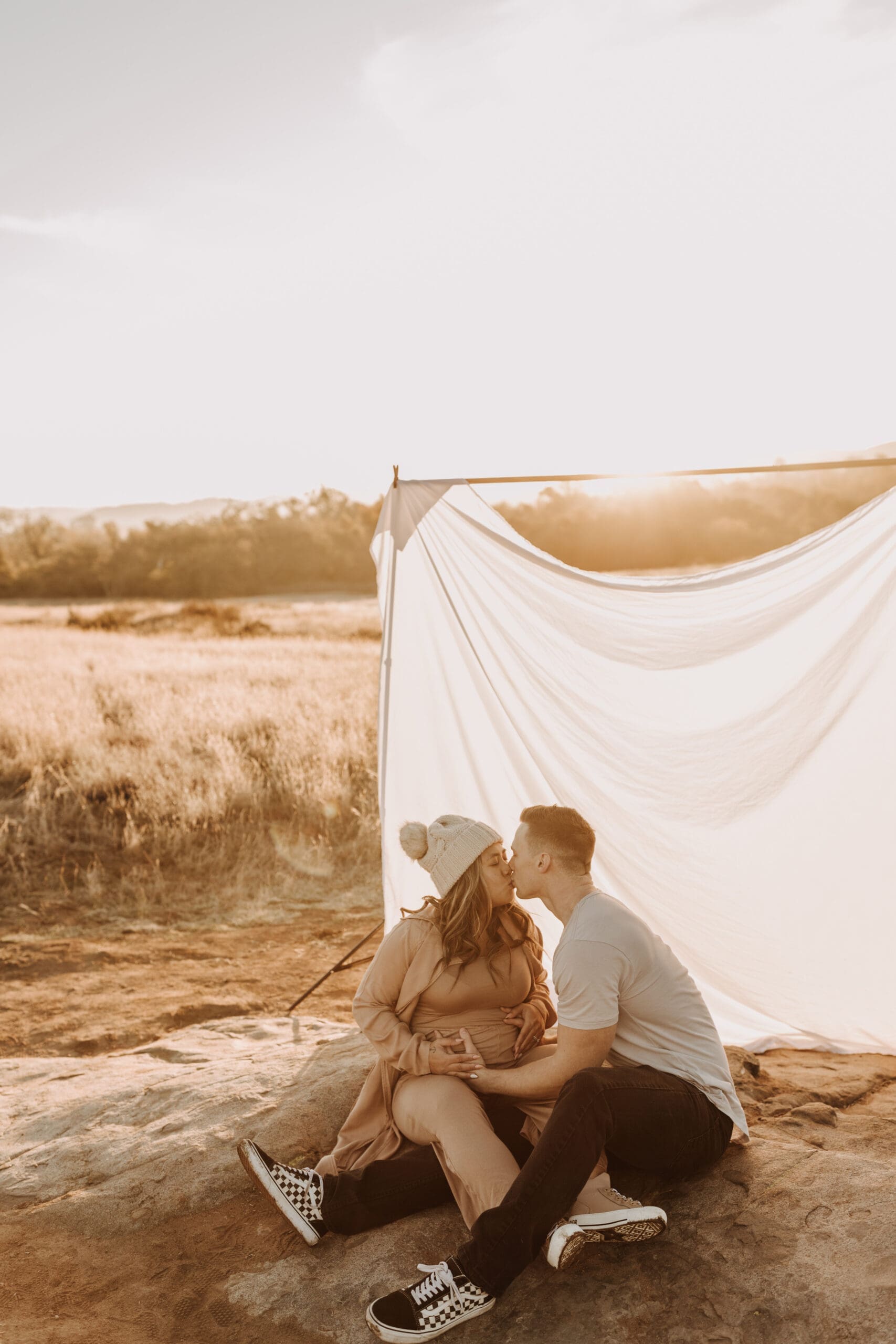 warm outdoor sunrise maternity photos San Diego brown tones backdrop pregnancy San Diego family photographer Sabrina kinsella