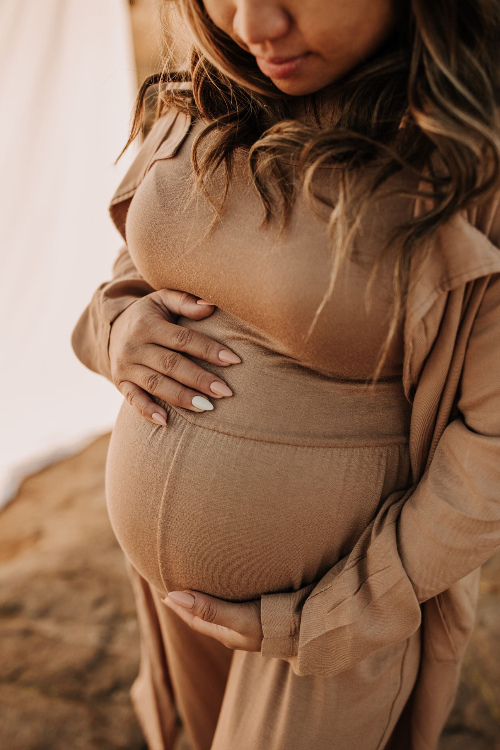 warm outdoor sunrise maternity photos San Diego brown tones backdrop pregnancy San Diego family photographer Sabrina kinsella