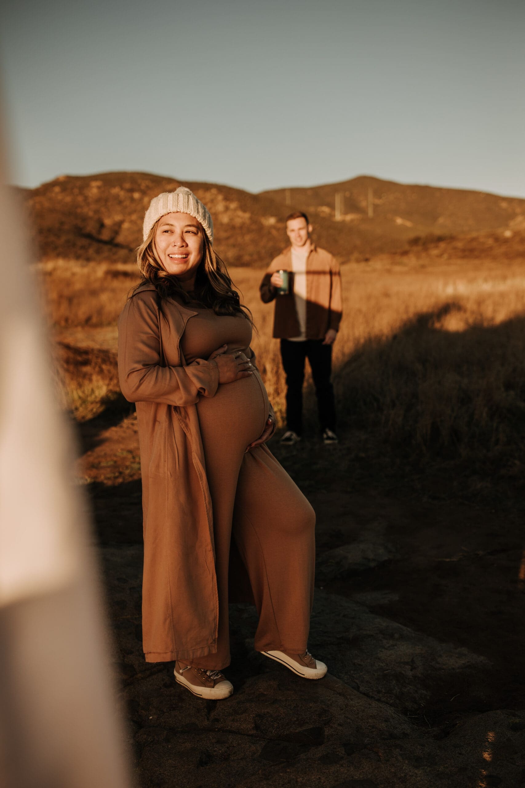 warm outdoor sunrise maternity photos San Diego brown tones backdrop pregnancy San Diego family photographer Sabrina kinsella