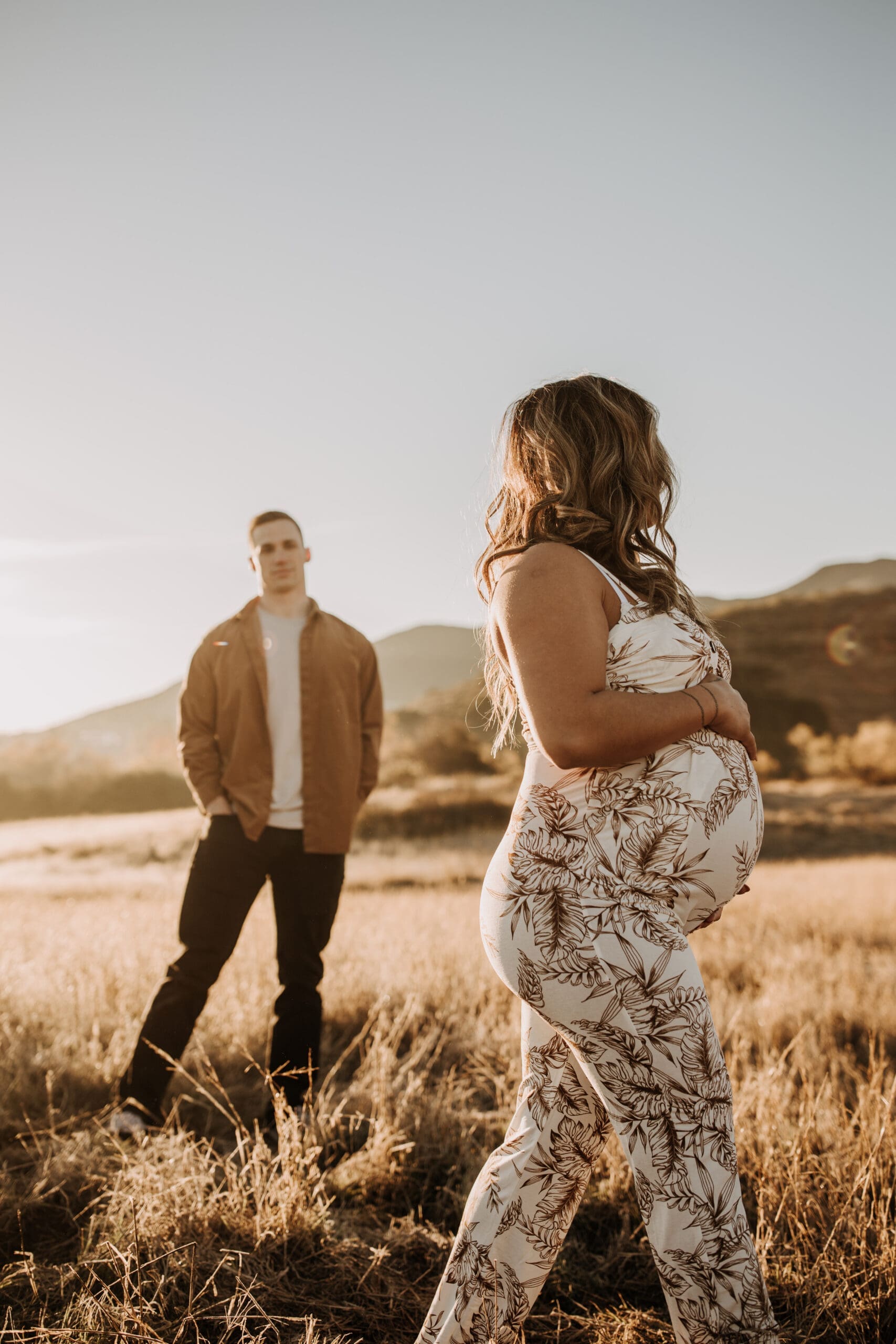 warm outdoor sunrise maternity photos San Diego brown tones backdrop pregnancy San Diego family photographer Sabrina kinsella