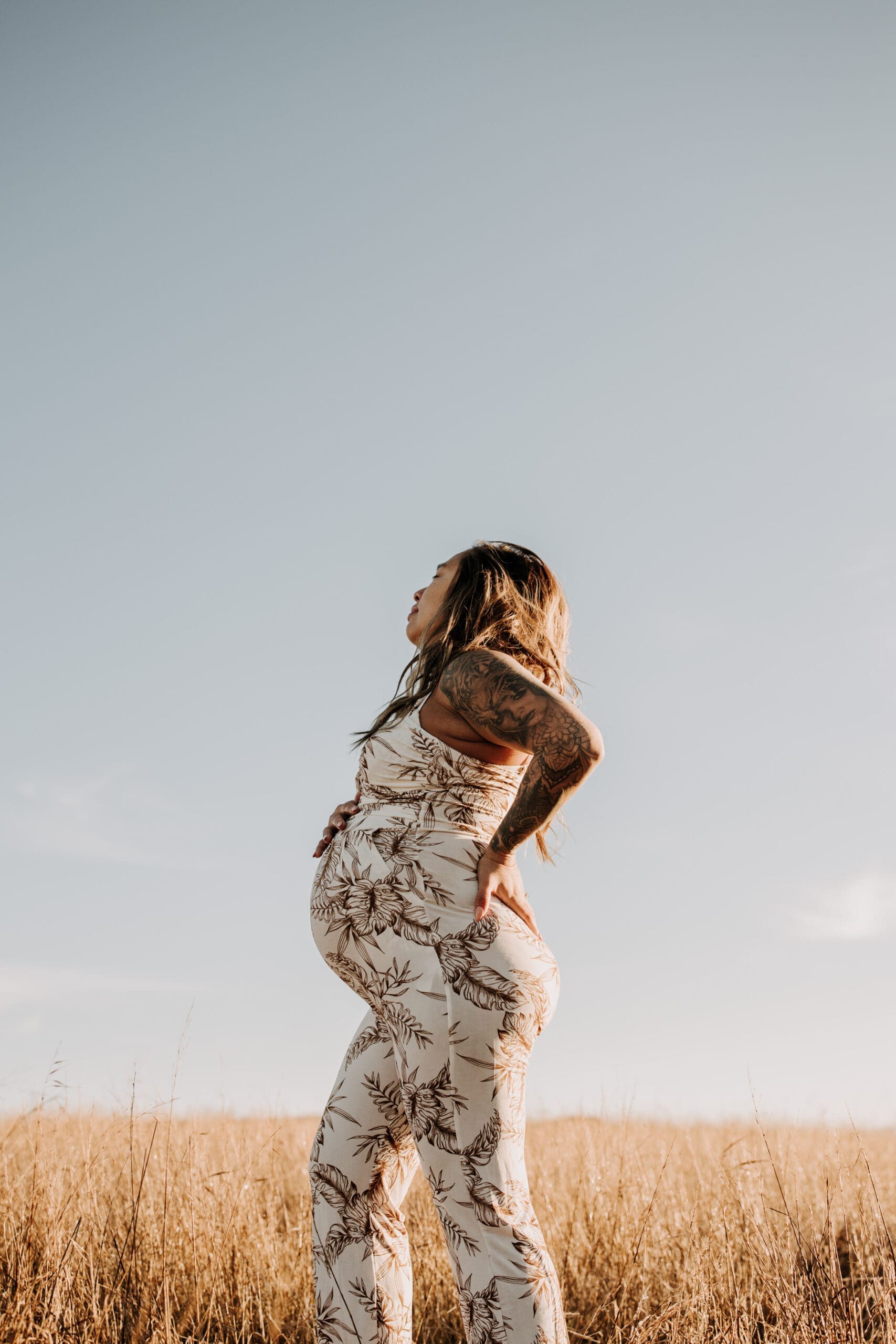 warm outdoor sunrise maternity photos San Diego brown tones backdrop pregnancy San Diego family photographer Sabrina kinsella