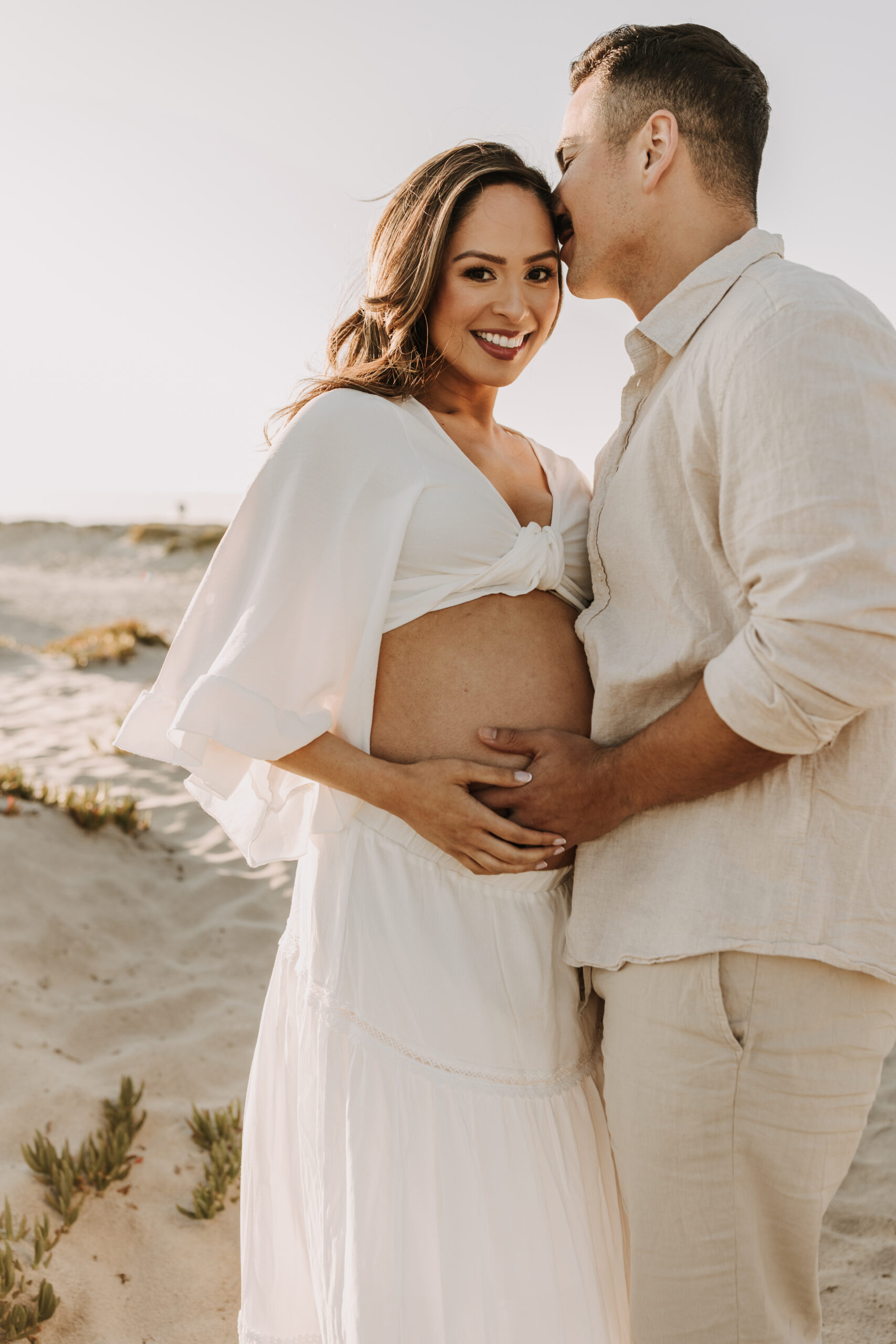 maternity fashion maternity photos beach photos sunset golden hour San Diego maternity photos blue dress pregnancy bright beautiful San Diego family photographer Sabrina kinsealla sabrinalynnphoto