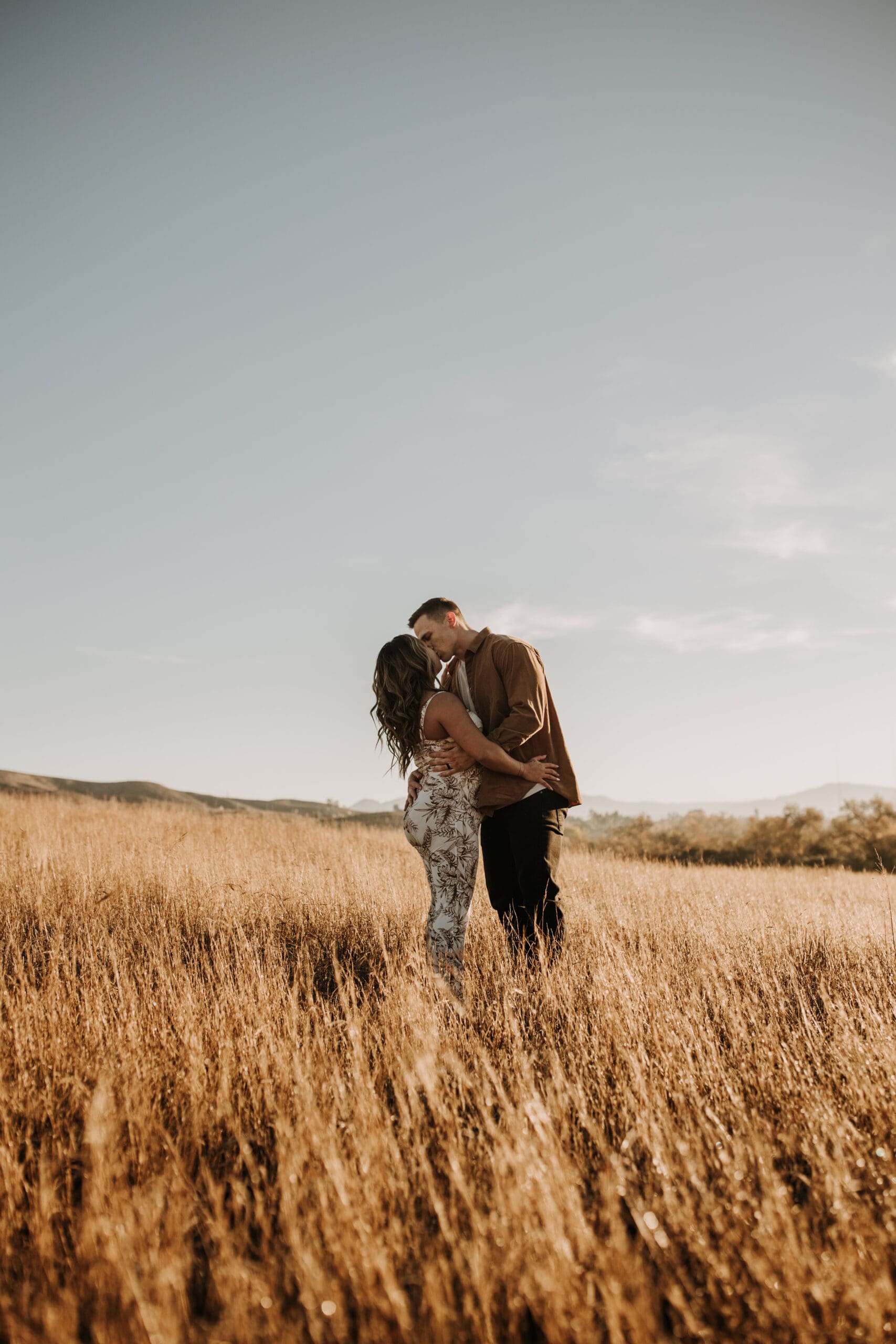 warm outdoor sunrise maternity photos San Diego brown tones backdrop pregnancy San Diego family photographer Sabrina kinsella