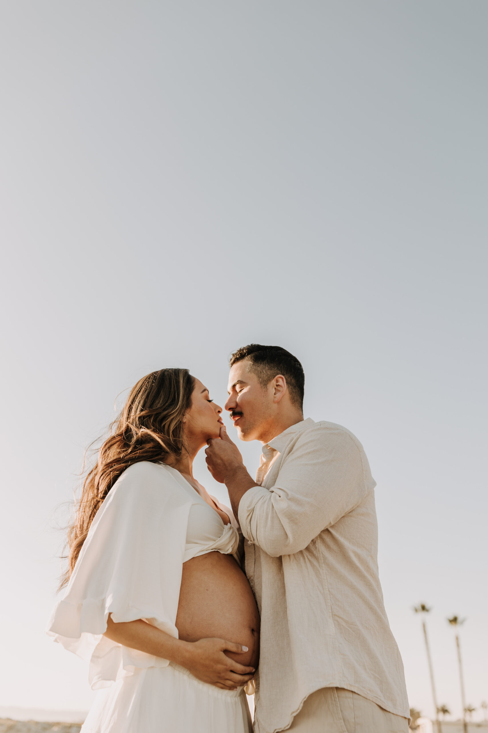 maternity fashion maternity photos beach photos sunset golden hour San Diego maternity photos blue dress pregnancy bright beautiful San Diego family photographer Sabrina kinsealla sabrinalynnphoto