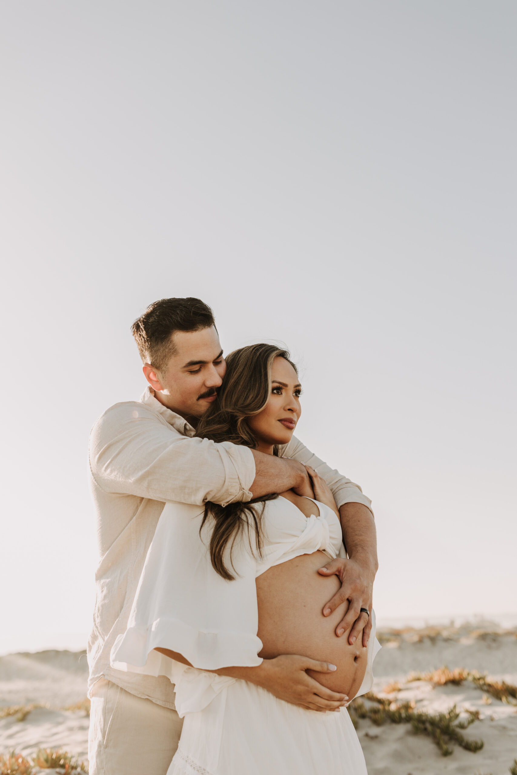 maternity fashion maternity photos beach photos sunset golden hour San Diego maternity photos blue dress pregnancy bright beautiful San Diego family photographer Sabrina kinsealla sabrinalynnphoto