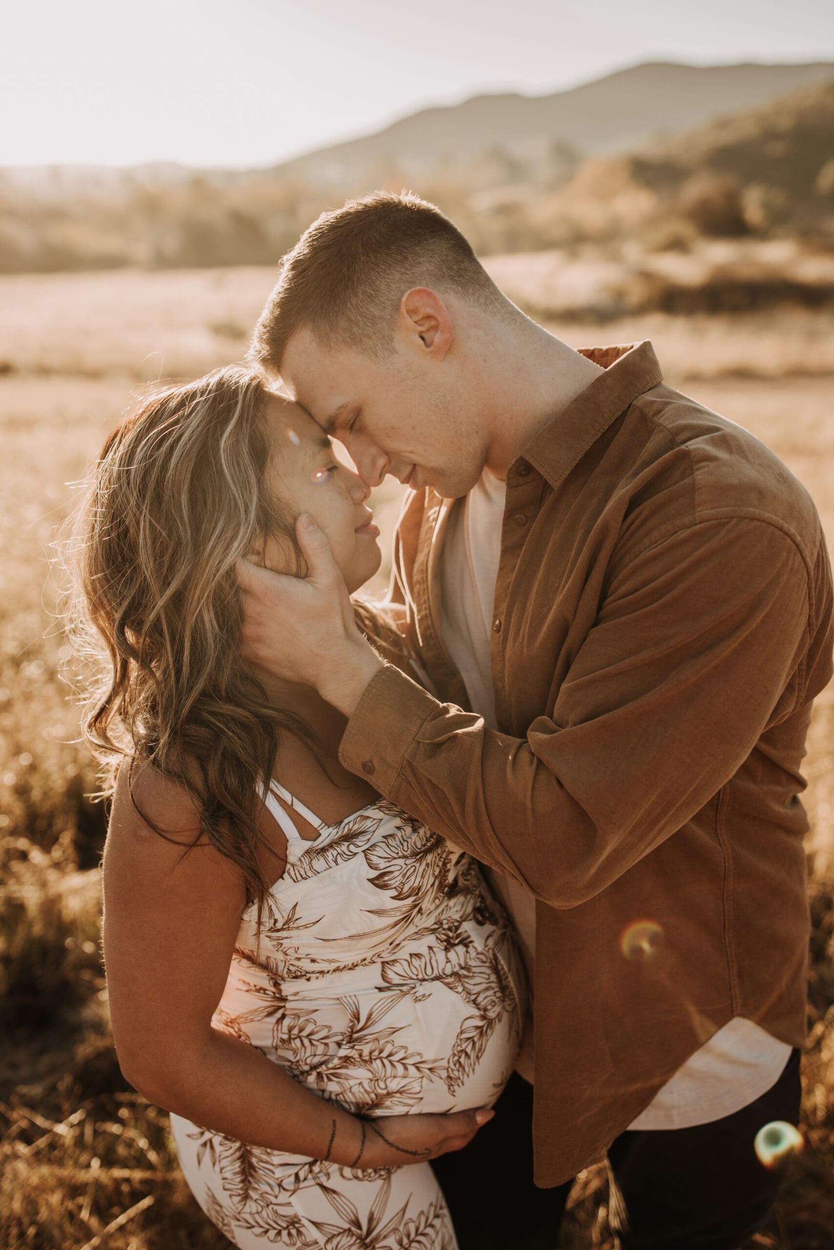 warm outdoor sunrise maternity photos San Diego brown tones backdrop pregnancy San Diego family photographer Sabrina kinsella