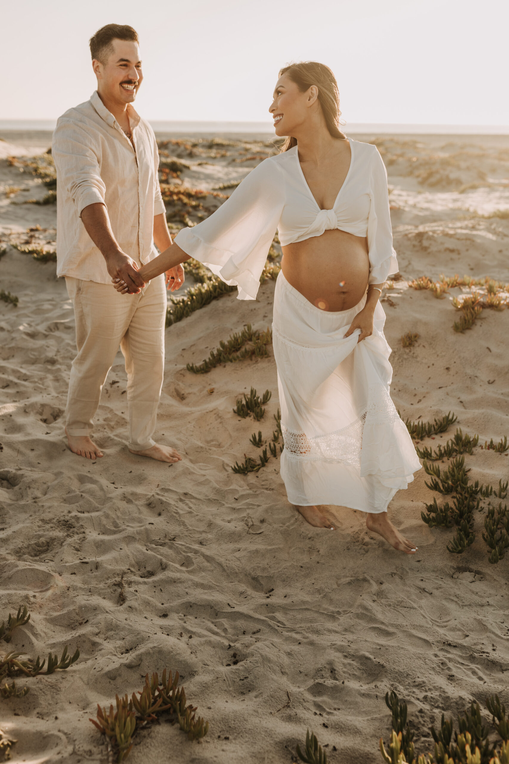 maternity fashion maternity photos beach photos sunset golden hour San Diego maternity photos blue dress pregnancy bright beautiful San Diego family photographer Sabrina kinsealla sabrinalynnphoto