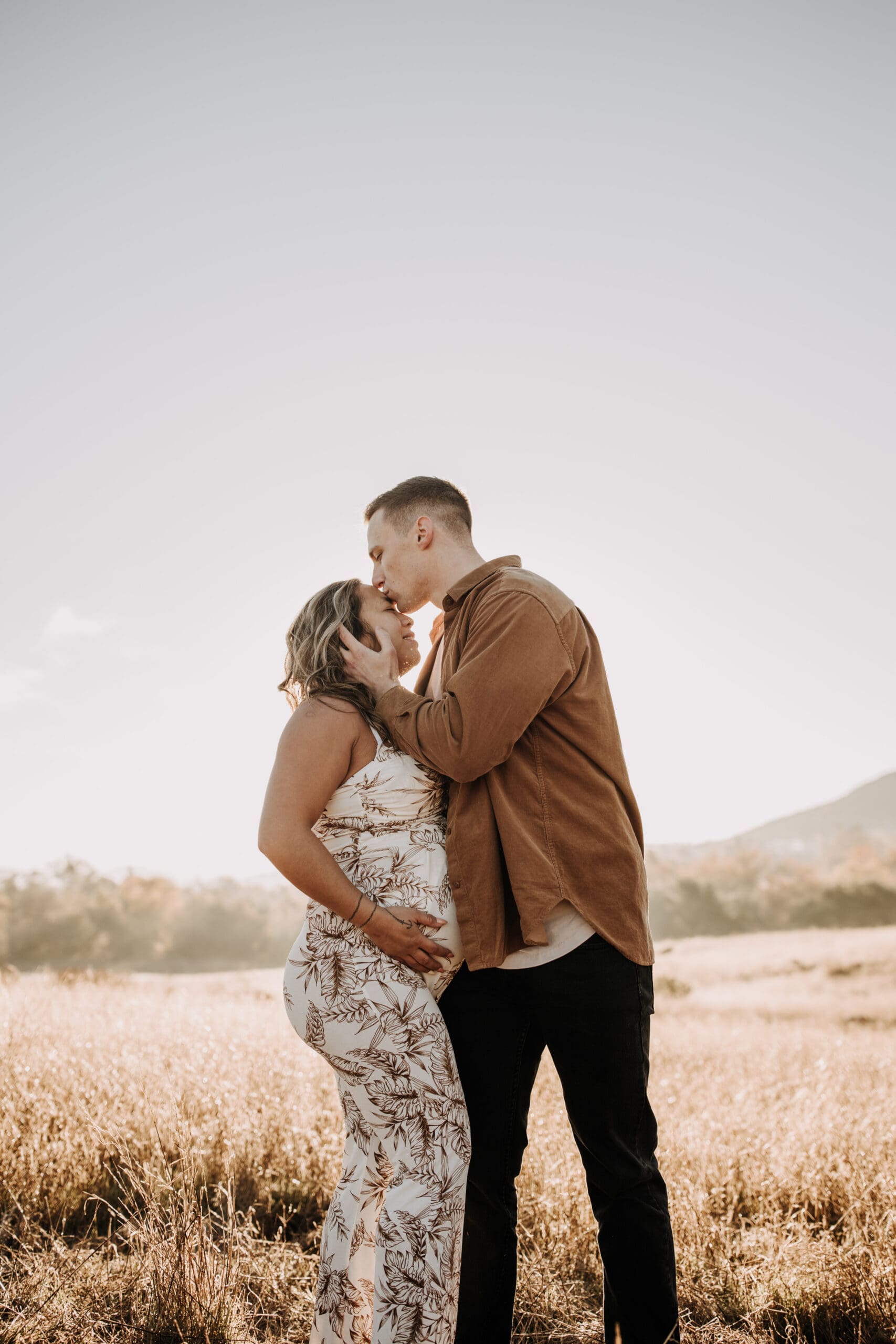 warm outdoor sunrise maternity photos San Diego brown tones backdrop pregnancy San Diego family photographer Sabrina kinsella