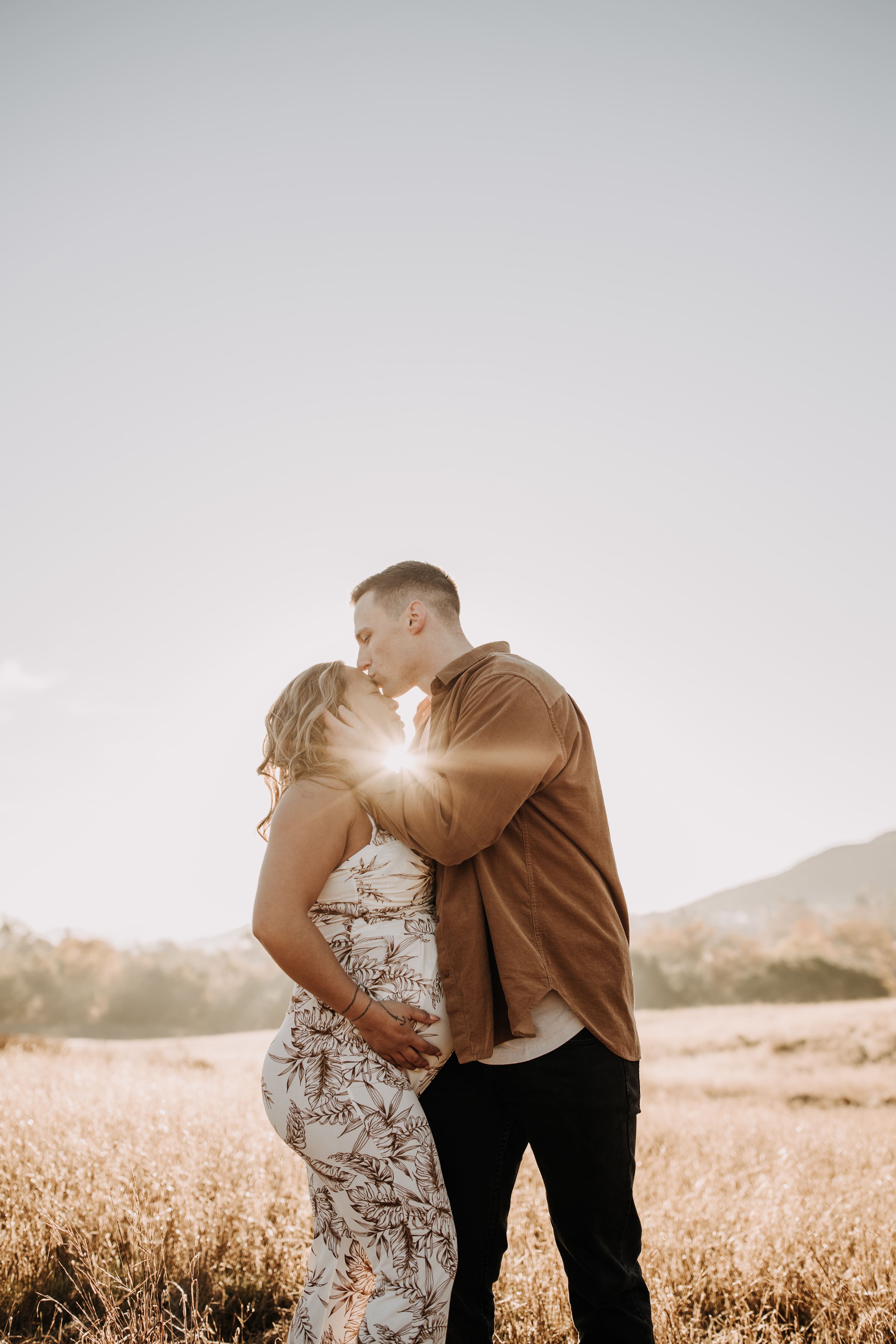 warm outdoor sunrise maternity photos San Diego brown tones backdrop pregnancy San Diego family photographer Sabrina kinsella