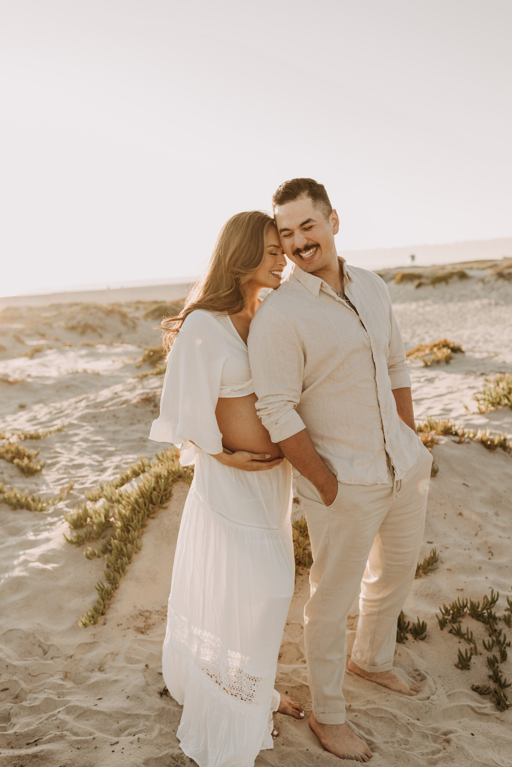 maternity fashion maternity photos beach photos sunset golden hour San Diego maternity photos blue dress pregnancy bright beautiful San Diego family photographer Sabrina kinsealla sabrinalynnphoto