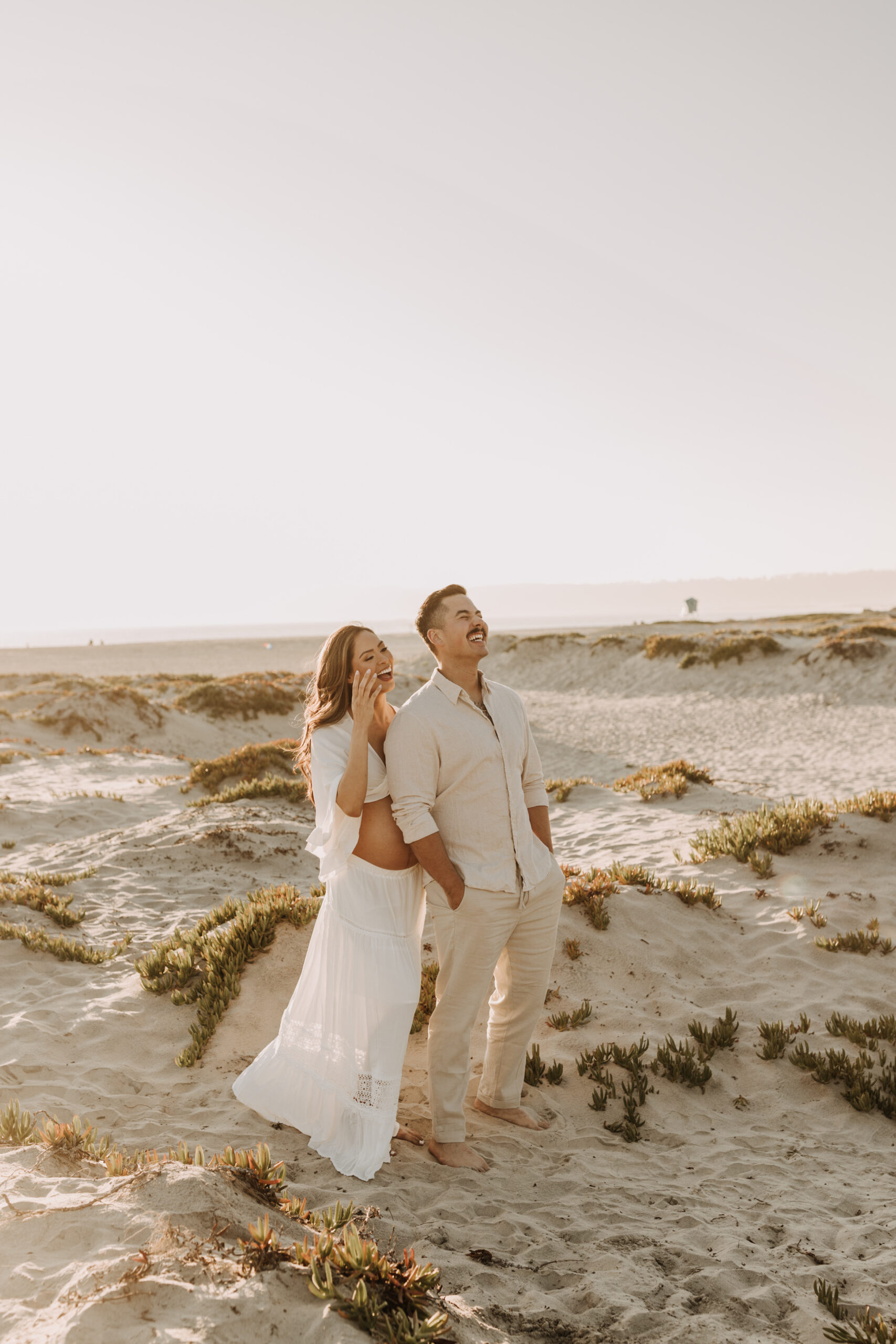 maternity fashion maternity photos beach photos sunset golden hour San Diego maternity photos blue dress pregnancy bright beautiful San Diego family photographer Sabrina kinsealla sabrinalynnphoto