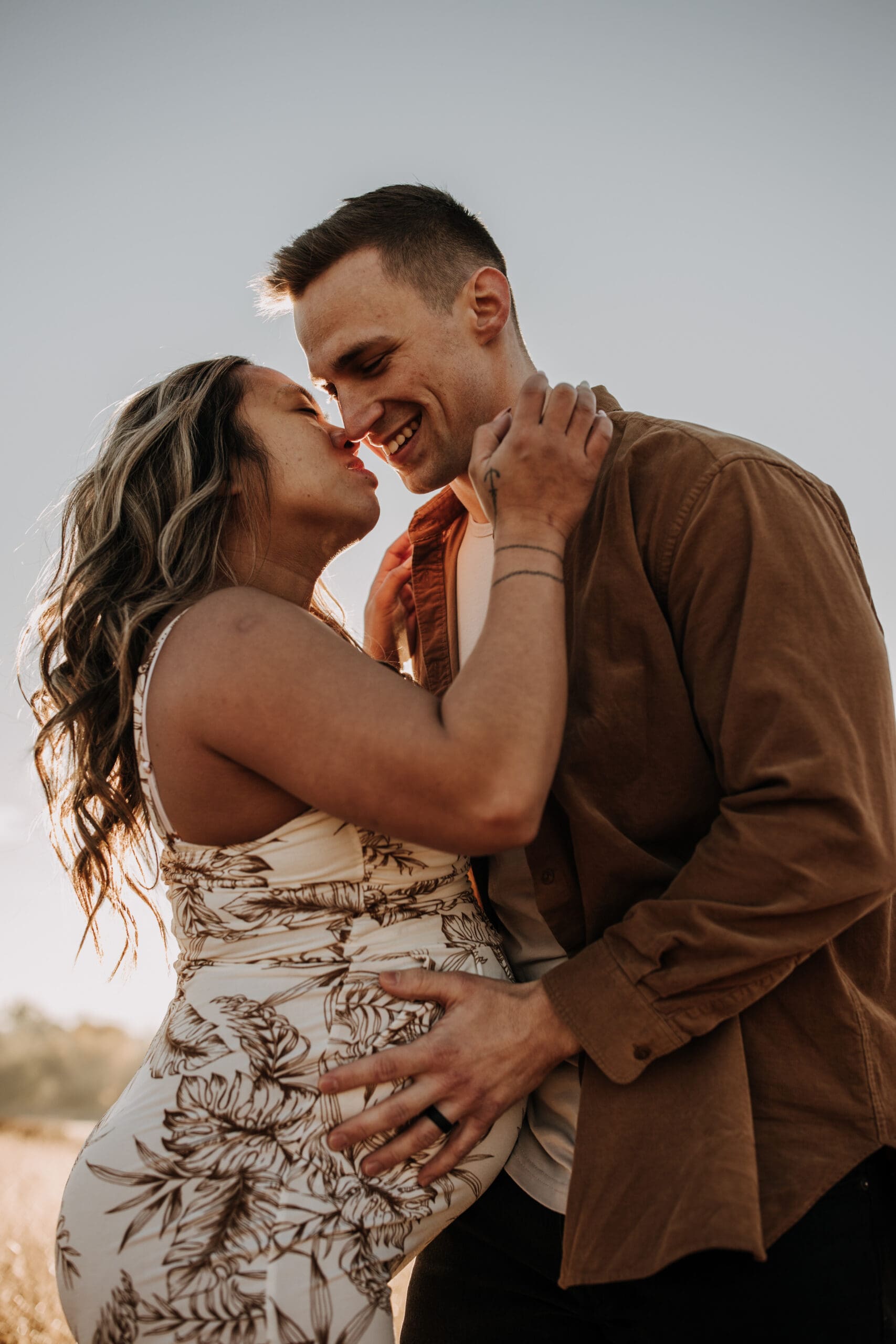 warm outdoor sunrise maternity photos San Diego brown tones backdrop pregnancy San Diego family photographer Sabrina kinsella