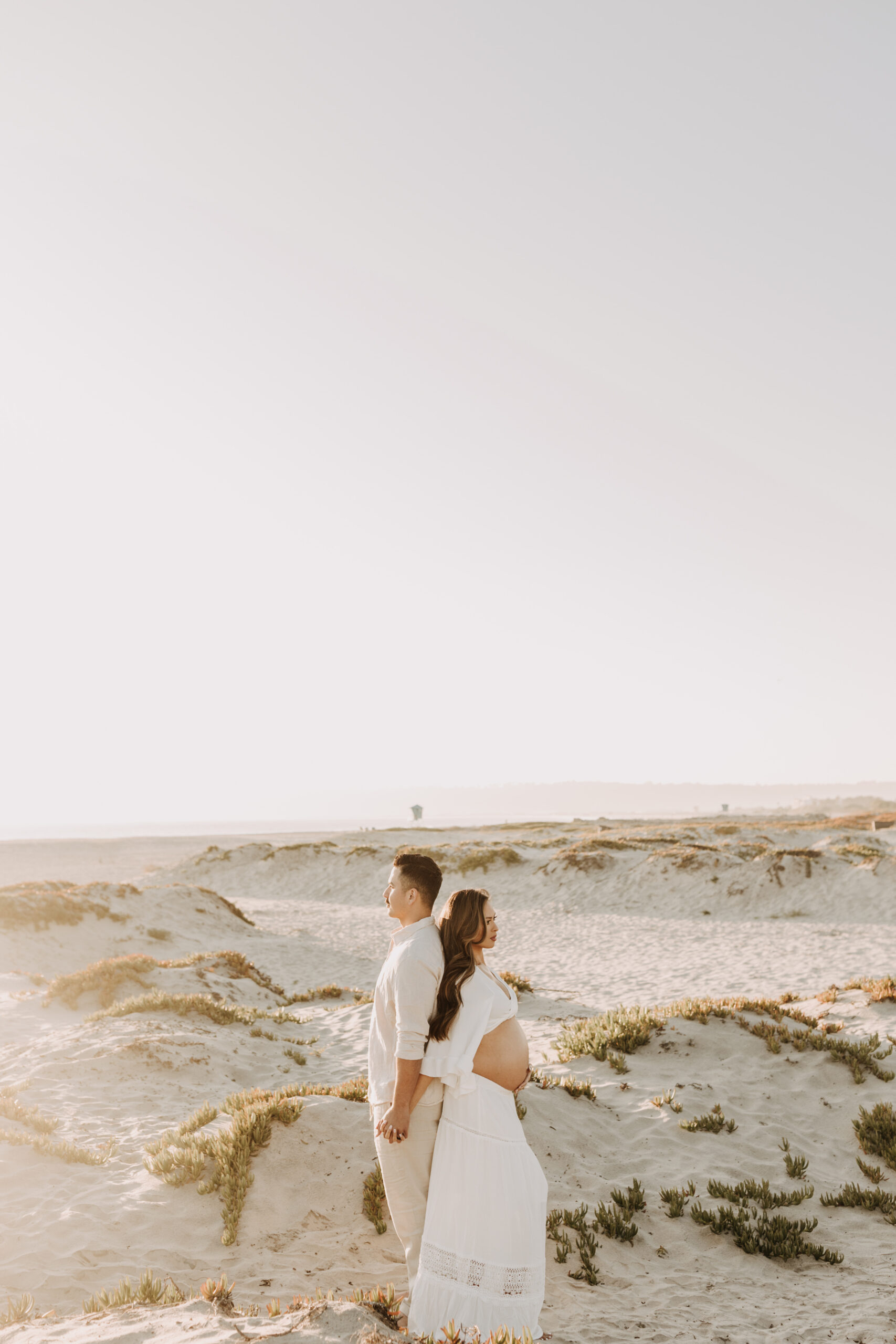 maternity fashion maternity photos beach photos sunset golden hour San Diego maternity photos blue dress pregnancy bright beautiful San Diego family photographer Sabrina kinsealla sabrinalynnphoto