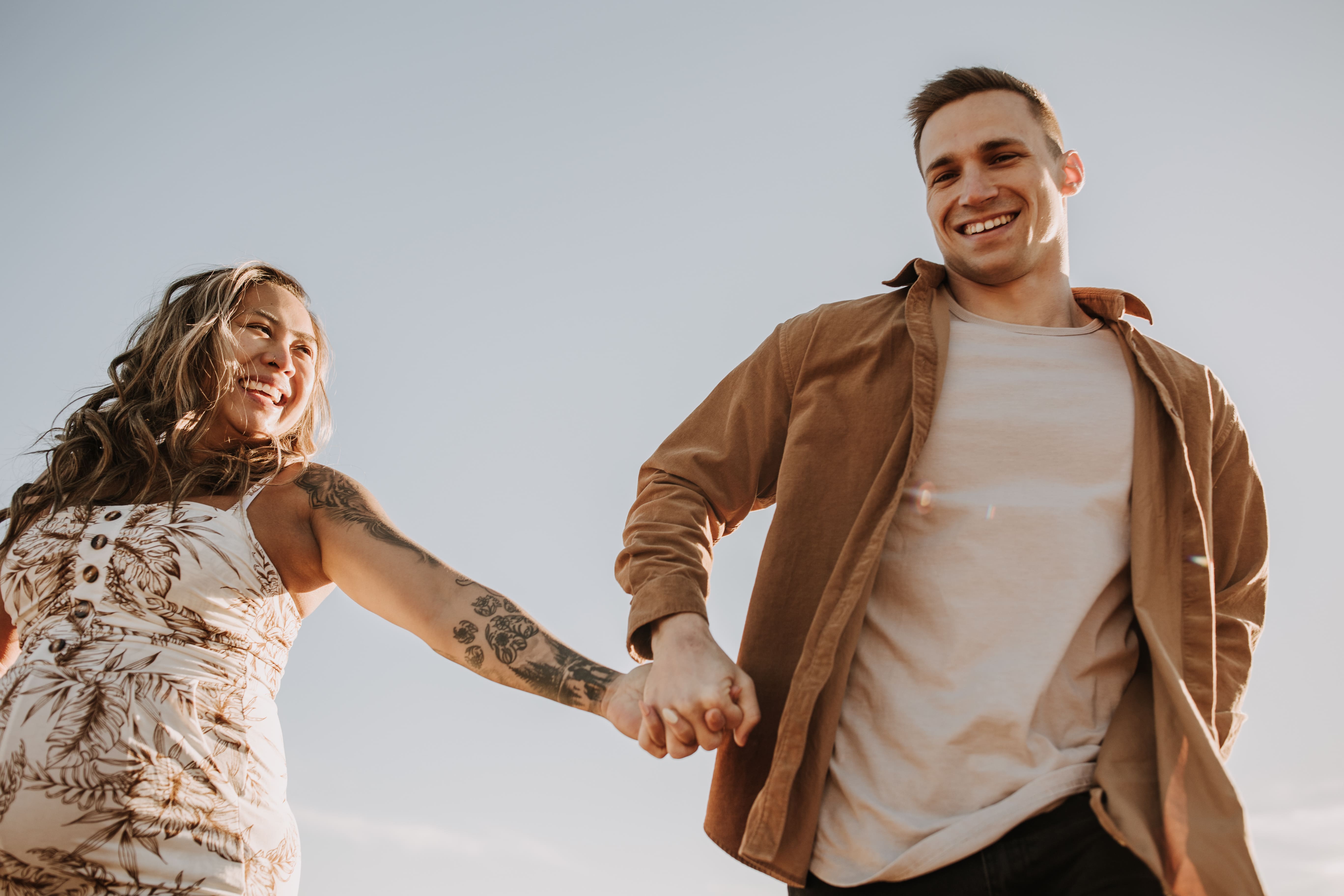 warm outdoor sunrise maternity photos San Diego brown tones backdrop pregnancy San Diego family photographer Sabrina kinsella