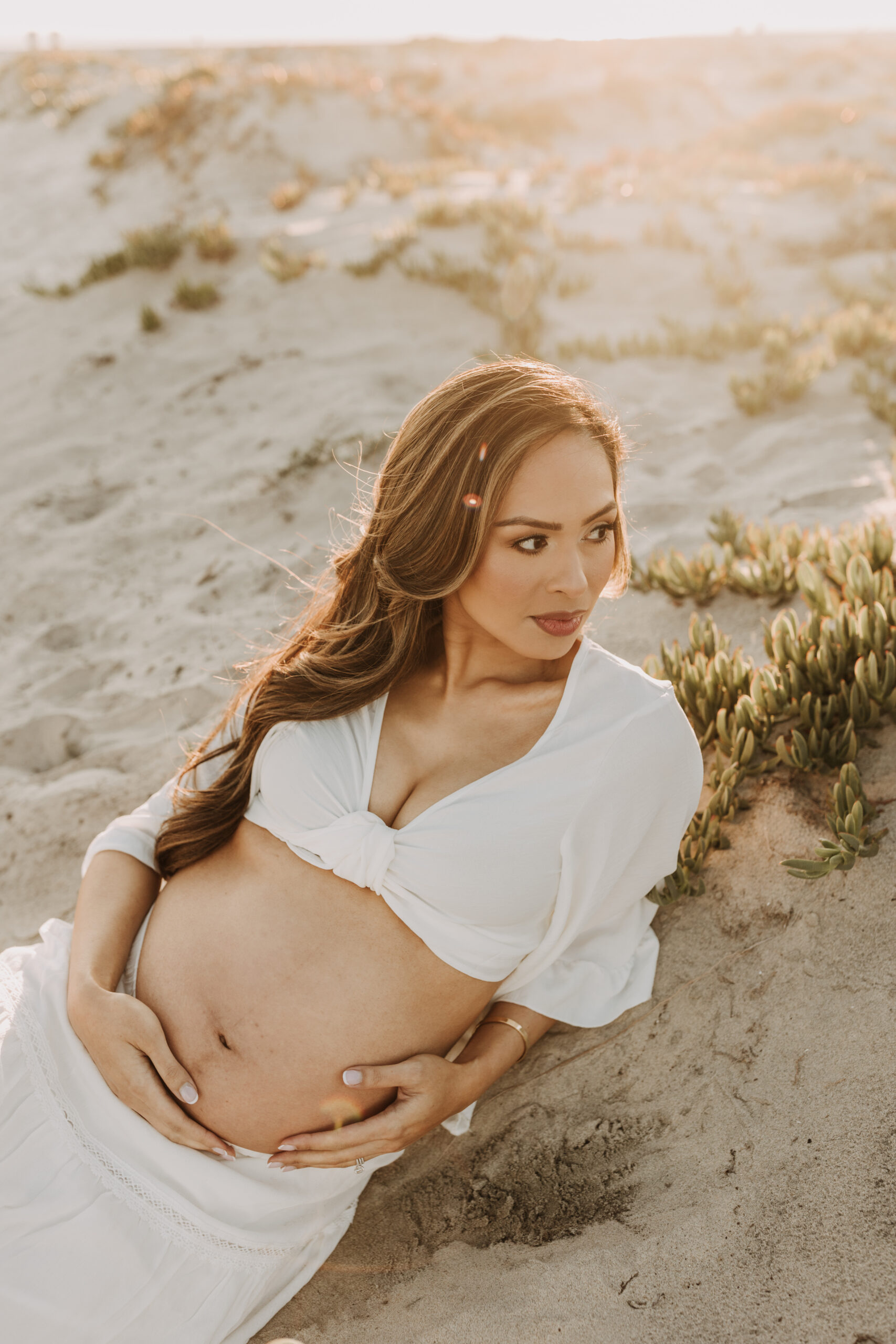 maternity fashion maternity photos beach photos sunset golden hour San Diego maternity photos blue dress pregnancy bright beautiful San Diego family photographer Sabrina kinsealla sabrinalynnphoto